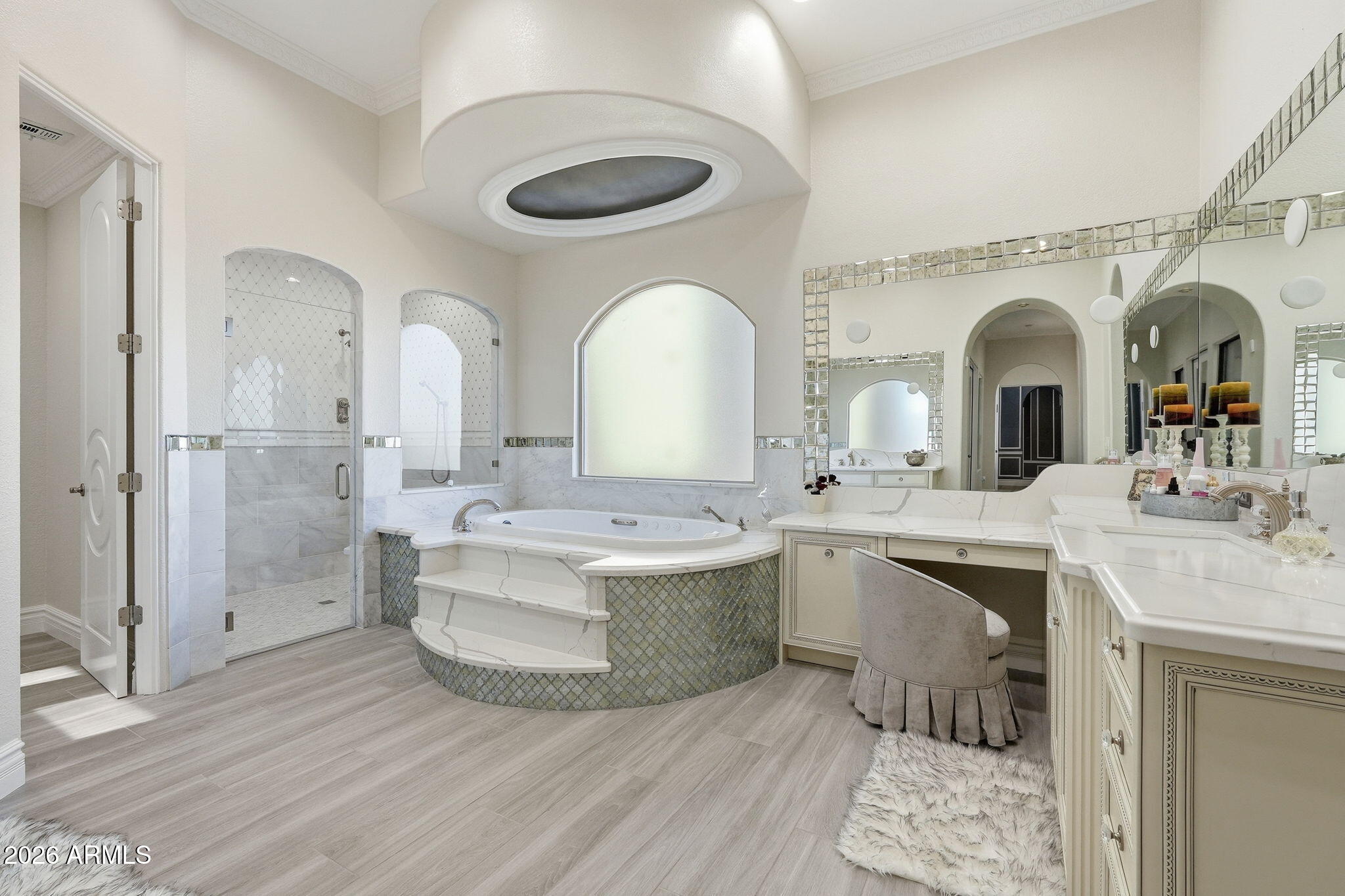 An incredible opportunity to own this stunning custom estate set on nearly an acre with no HOA and breathtaking San Tan Mountain views. With room to roam and endless potential, the backyard is a true blank canvas--ready for your dream pool, outdoor entertainment retreat, horses, or all of the above. Thoughtfully designed for both comfortable everyday living and memorable entertaining, the home showcases beautifully remodeled formal living and dining rooms that create an elegant first impression. The luxurious primary suite has been completely reimagined and features a private sitting room, spa-inspired bathroom, and custom California Closet. The expansive basement is perfect for hosting, offering a theater room and game room for the ultimate entertainment experience. On the main level, you'll also find a craft room, wine room, versatile flex space, and a dedicated workout room. A charming courtyard sets the tone for Arizona living with a cozy fireplace, built-in BBQ, and spool--perfect for relaxing evenings or gathering with friends. Owned solar adds energy efficiency and long-term savings to this exceptional property.