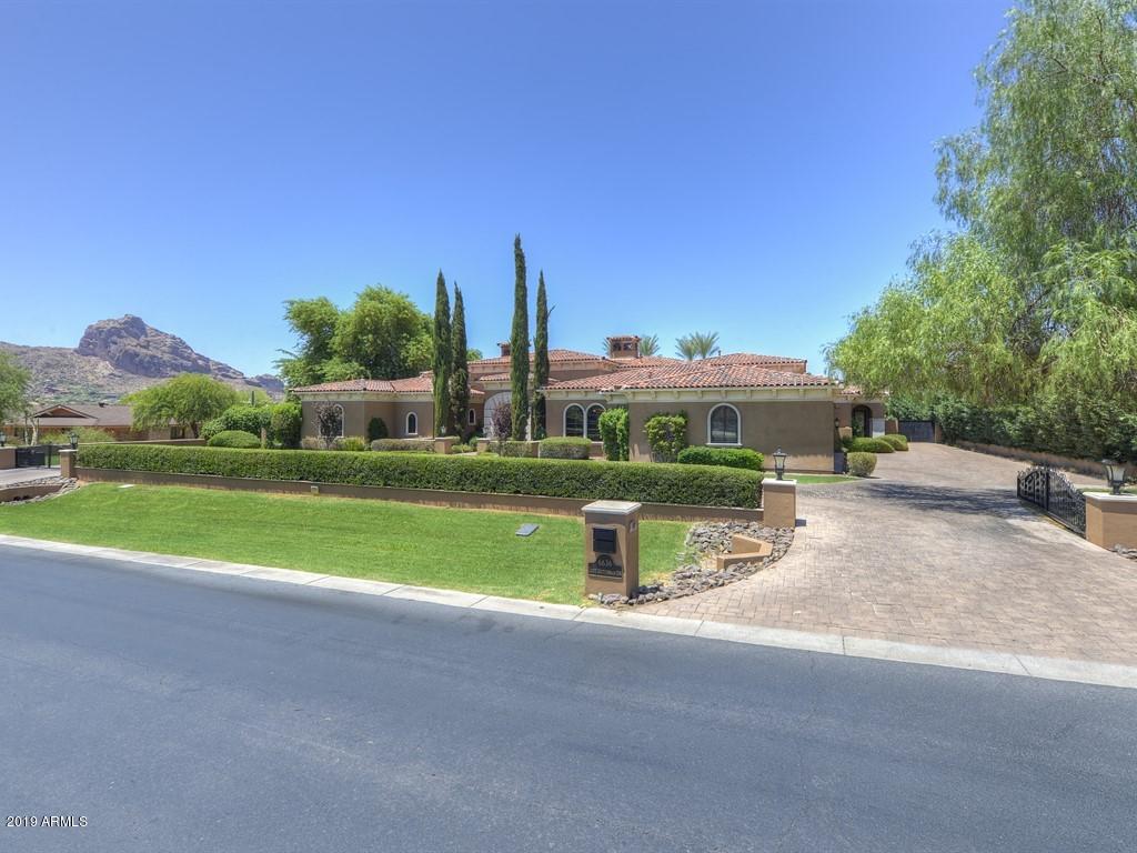 Unreal views in all directions on this elevated flat lot from this beautifully elegant formal Mediterranean estate compound. Just under 9500 square feet livable with too many amenities to mention. Truly a must see with its grand living rooms, stone fireplaces, large wine cellar, formal office, large furnished automated theater, state of the art home management system, separate self contained guest house and much, much more in addition to being built by Legendary Homes, one of PV's most exclusive builders. Don't miss this one!!