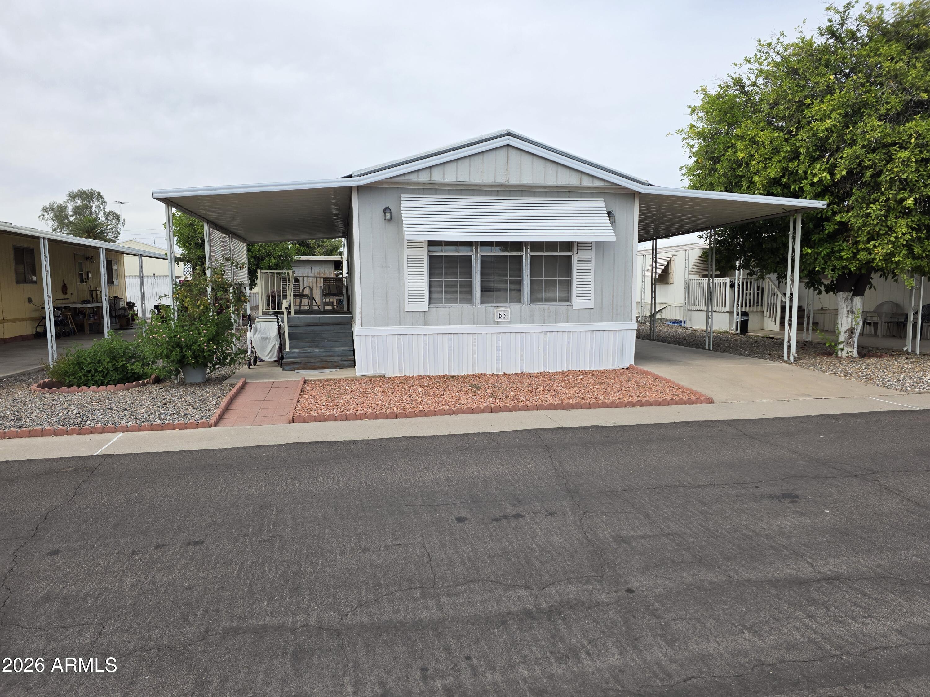 COMPLEX IS AGE RESTRICTED 55+ / Same owner last 19 years. Well Maintained New shower installed in 2024, AC replaced in about 2021 - 2022 and is serviced every 6 months.  Furniture to convey with property see list in documents section.  Separate Workshop with electricity on west side of unit.