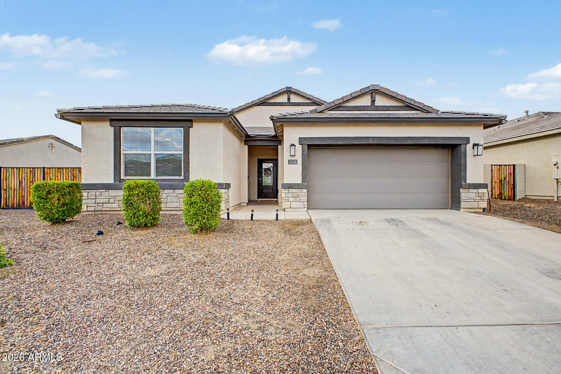 Incentives available with seller's preferred lender, including a first-year rate 1% below market and up to $4,000 toward closing costs or rate buydown. $0 down programs available. Welcome to a beautifully updated almost brand new home! A welcoming foyer opens to bright living spaces with tile flooring and recessed lighting. The kitchen features granite counters, stainless steel appliances, a large island with breakfast bar, walk-in pantry, and stylish cabinetry. The primary suite offers dual sinks and a spacious walk-in closet. Enjoy a private backyard with covered patio and low-maintenance turf. Includes a 2-car garage, HUGE RV gate with large side yards, and access to community pool, splash pad, gym, and clubhouse. Don't miss it!