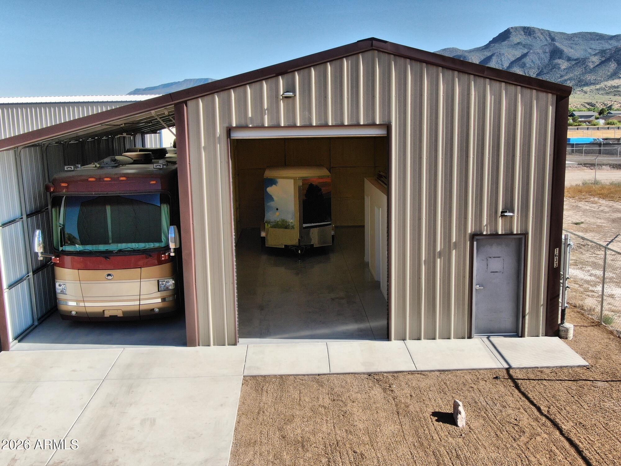 For Sale! Exceptional opportunity to own a newly constructed steel building in Camp Verde's growing industrial district. This versatile property is perfect for a business, workshop, contractor's headquarters, toy garage, or the ultimate man cave. Features include a finished private office, private bathroom, oversized RV parking, and plenty of space for trailers, equipment, vehicles, or recreational toys. With easy access, quality construction, and flexible C-3 zoning, the possibilities are endless. Whether you're expanding your business or looking for the perfect place to work and play, this property is ready for you.