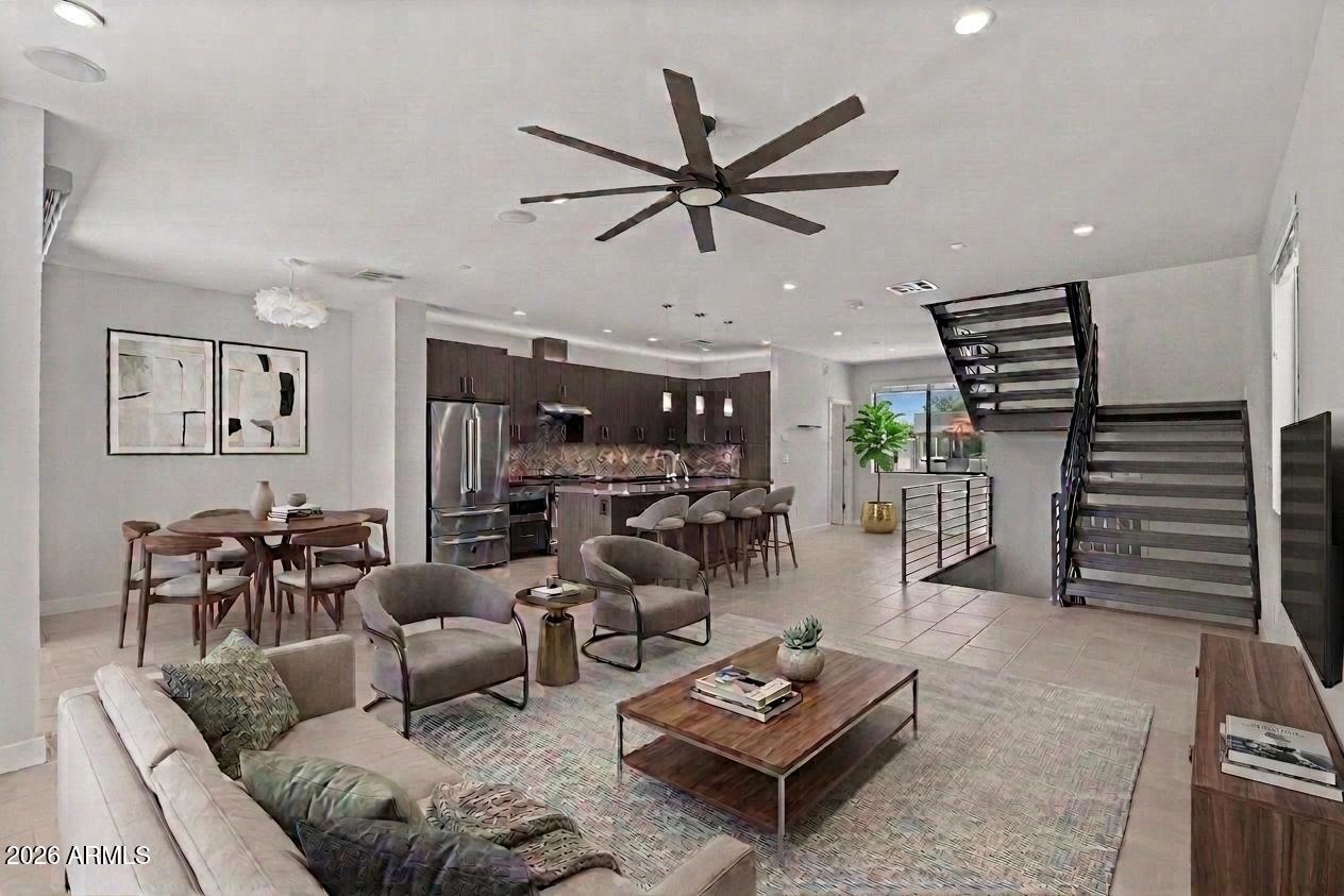 An incredible opportunity in Aerium Encore, this highly upgraded Scottsdale townhome features a rare three en-suite bedroom floor plan plus a main level powder room, offering privacy and functionality throughout. Enjoy Camelback Mountain views from multiple rooms along with exceptional privacy. Better than new and move-in ready, the open-concept floor plan is filled with natural light and designed for seamless indoor/outdoor living. The kitchen features a Viking gas range and opens to the main living spaces, while the oversized private patio with a built-in gas BBQ is perfect for entertaining or enjoying Arizona evenings. Located just minutes from Old Town Scottsdale with easy access to some of the area's best restaurants, shopping, and nightlife.