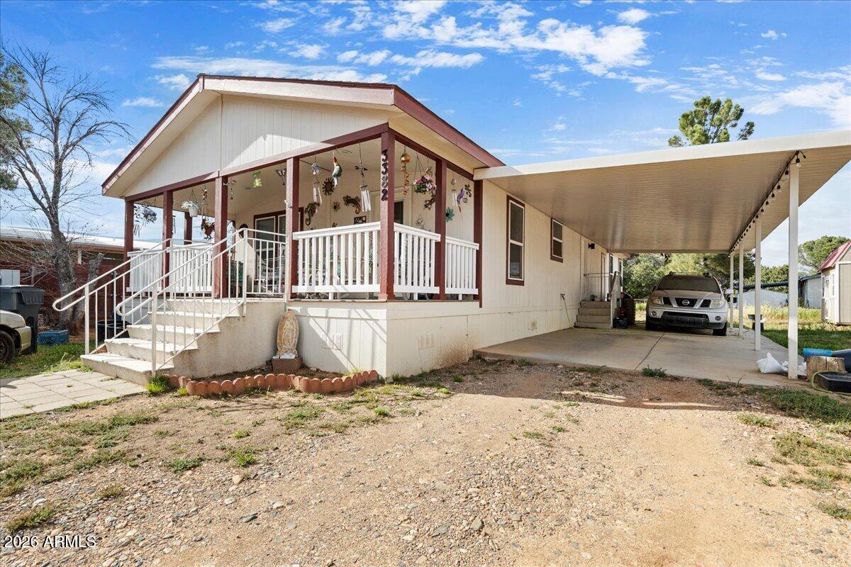 This charming 2-bedroom plus office/bedroom , 2-bathroom home in the heart of Cottonwood offers the perfect blend of modern comfort and easy Arizona living. Built in 2015, this well-maintained residence features an open-concept layout with 1,217 square feet of bright, airy living space. It sits on a double lot and includes a new storage building.

The best part is the covered front porch. You will find yourself spending hours with friends and family enjoying this outdoor space.