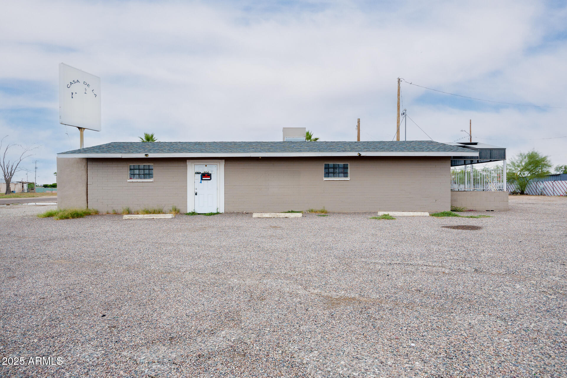 High-Visibility Corner Investment with Flexible Commercial Use. Seize this rare opportunity on Casa Grande's busy Jimmie Kerr Blvd! This 1,536 SF former tavern on 0.44 AC offers exceptional frontage, a dedicated turn lane, and easy access to I-10. Perfect for bar, drive-thru, retail or professional office conversion, this adaptable property sits amid Casa Grande's booming industrial and residential growth corridor. Strong traffic counts, ample parking, and versatile PAD Zoning make it ideal for owner-users or investors seeking a site in one of Arizona's fastest-growing markets.