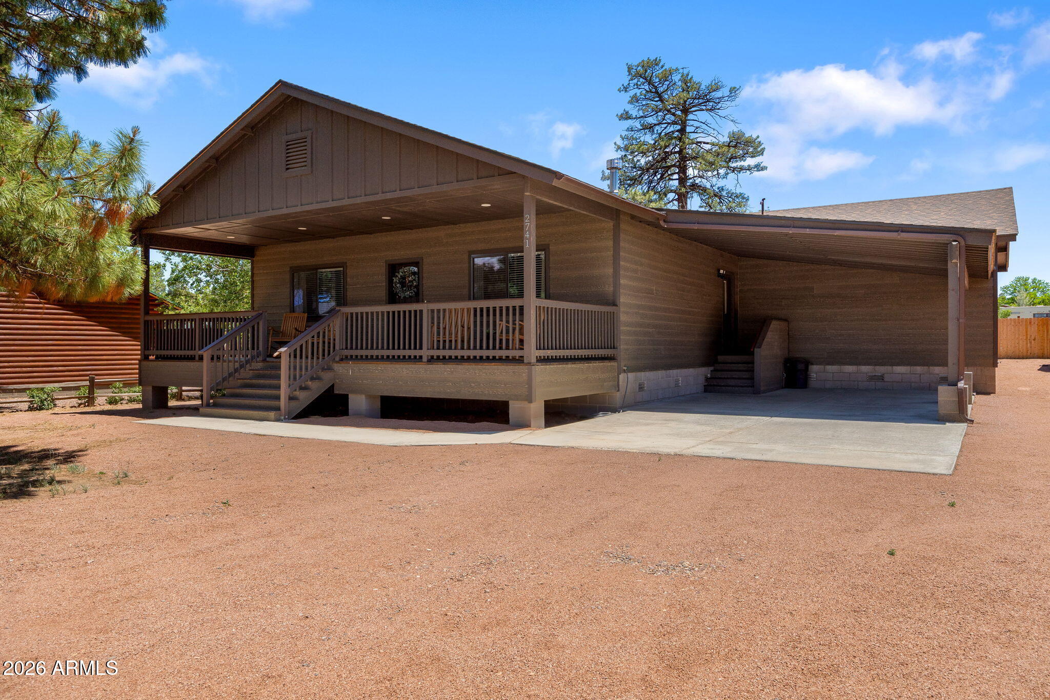 Built in 2022, this beautifully designed 4-bedroom, 3-bath mountain retreat offers 2,180 sq ft of modern comfort and rustic elegance. The open-concept floor plan features vaulted tongue-and-groove ceilings, luxury vinyl plank flooring, and a spacious great room ideal for gathering with family and friends. The kitchen showcases quartz countertops, stainless steel appliances, abundant cabinetry, and a large island with seating. The split floor plan provides privacy, including a spacious primary suite with ensuite bath. Enjoy covered front porch living, ample parking, and low-maintenance outdoor spaces. Perfect as a full-time residence, vacation getaway, or investment property in the cool mountain air of Overgaard.