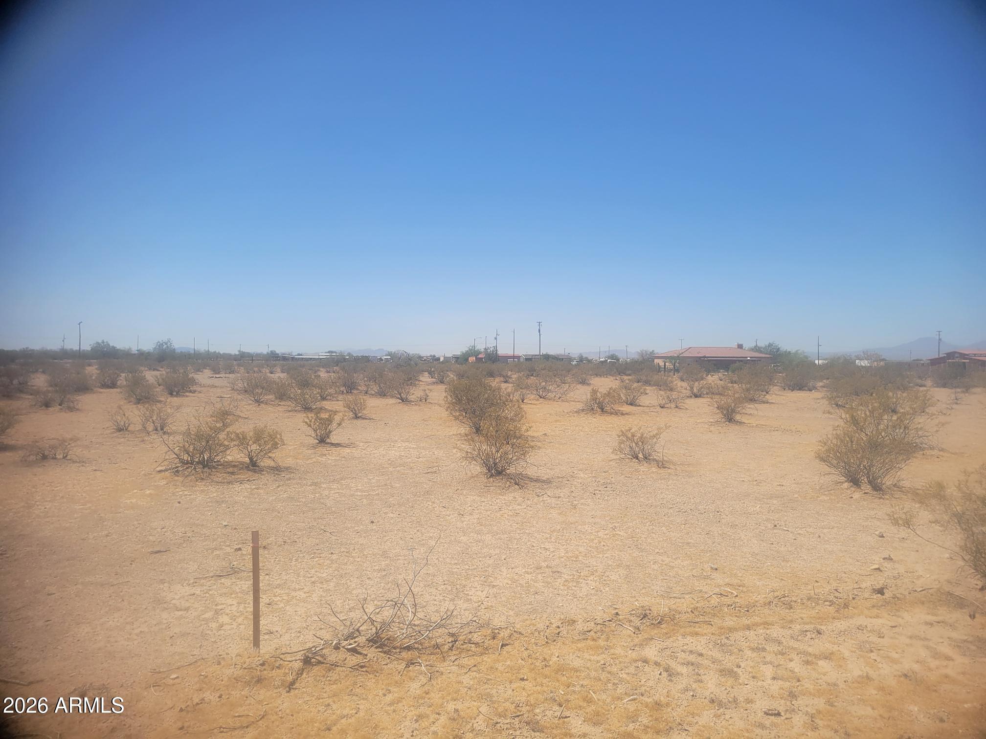 What a find! A 2 acre corner lot located in Indian Valley Ranchettes. Minutes from Casa Grande and I-10 and easy access to Maricopa City. All roads are now freshly paved. Electric is right across the street too. The lot is square, clean and level, ready for your home. No HOA. Gorgeous mountain views! A must-see!