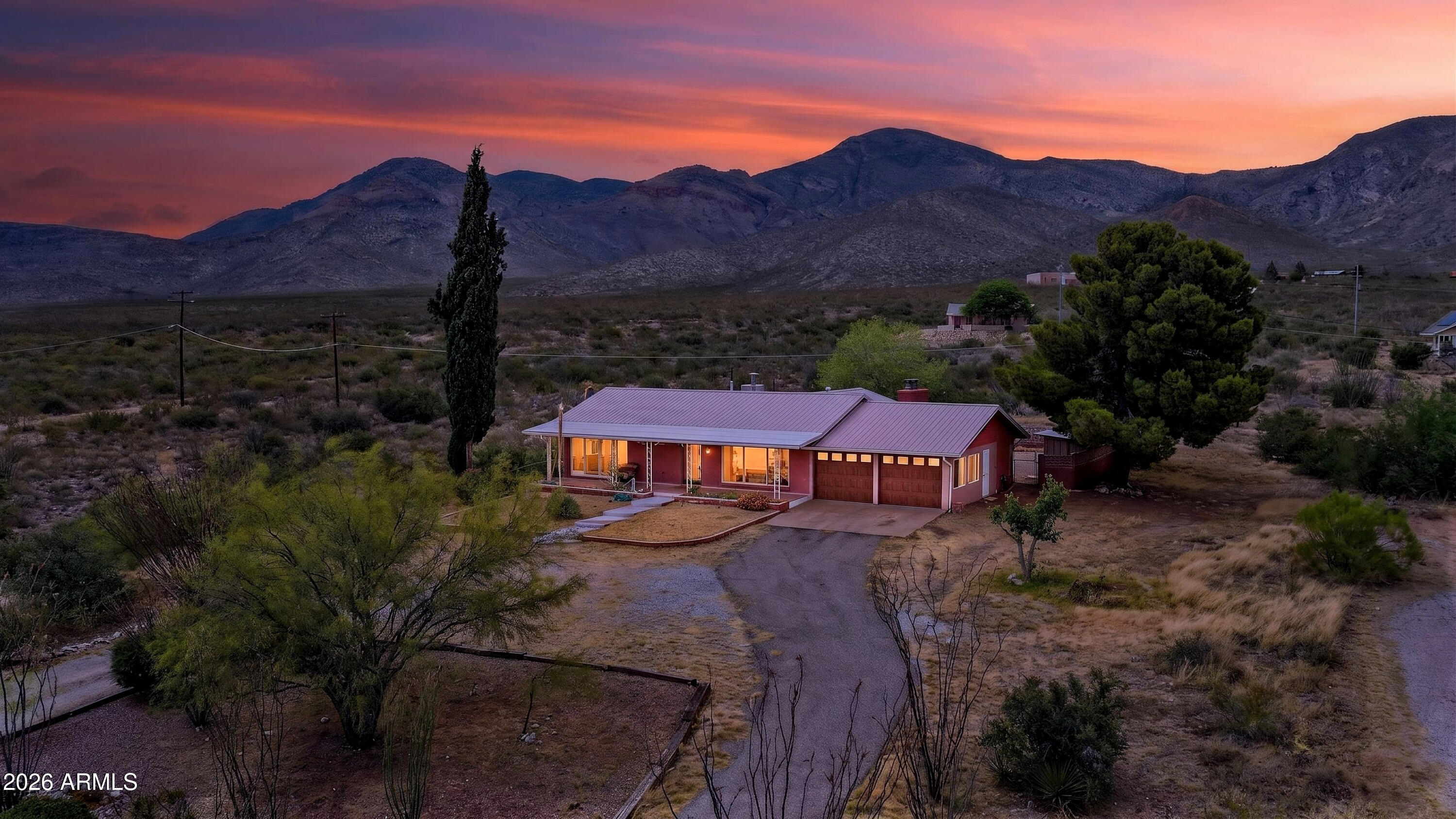 Enjoy peaceful living, beautiful views, and plenty of space at this rare Bisbee find in San Jose Estates. Set on nearly 1.8 acres, this 2-bedroom, 2-bath home offers 1,531 square feet of comfortable living with room to relax, entertain, and take in the stunning desert scenery. Inside, you'll find a practical layout with generous living space, highlighted by a Lee Adcock river rock wall in the family room that adds warmth, character, and a true custom touch. Outside, you can make the most of the open land, quiet surroundings, and spectacular sunsets. A 2-car garage and abundant storage add convenience, making this property as functional as it is charming. With its blend of privacy, space, and scenic beauty, this home is a standout opportunity in one of Bisbee's desirable areas.