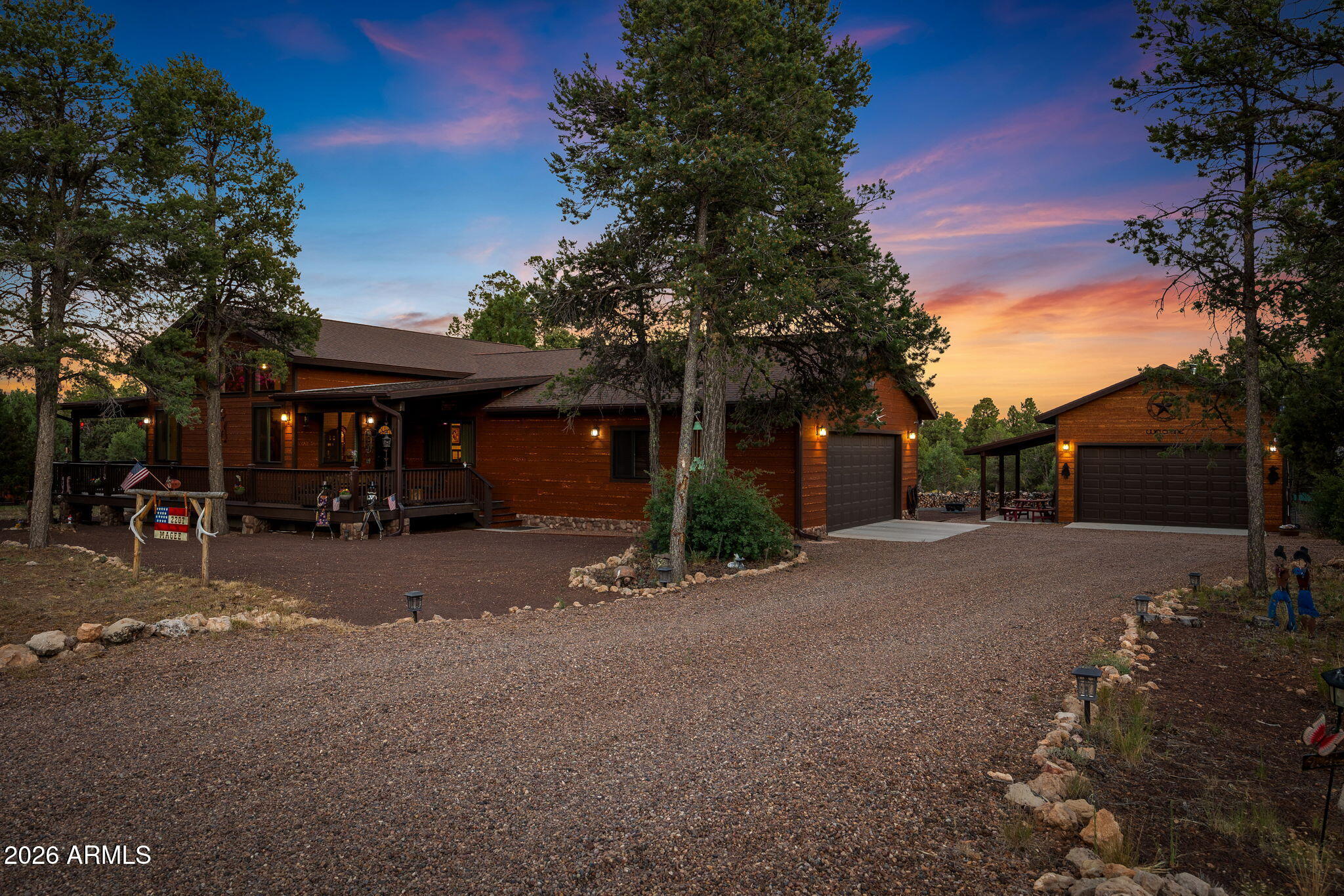 A private mountain retreat in Forest Trails Unit IV, nearly one full acre (0.996 acres), beautifully designed 2bed/2bath 1,608 sqft with rustic mountain charm was built in 2020. Covered front porch, open concept floor plan. The great room features a stunning tongue-and -groove ceiling, with stone covered gas fireplace and a mini split unit. Kitchen showcasing beautiful country white cabinetry, oversized center island (50'' x 93'') , a hammered copper range hood, abundant counter space and storage.  LVP flooring throughout.  Spacious primary suite with mini split, walk in 4X8 shower and closet. Hall closet built in gun safe and a generously sized laundry room. The attached 2 car garage has a separate hot water heater storage closet and an additional pantry/workspace/storage closet. Back deck with 2-person hot tub and backyard ramada.  Detached shop/workshop with covered patio and wood-burning stove.  A must-see property!
