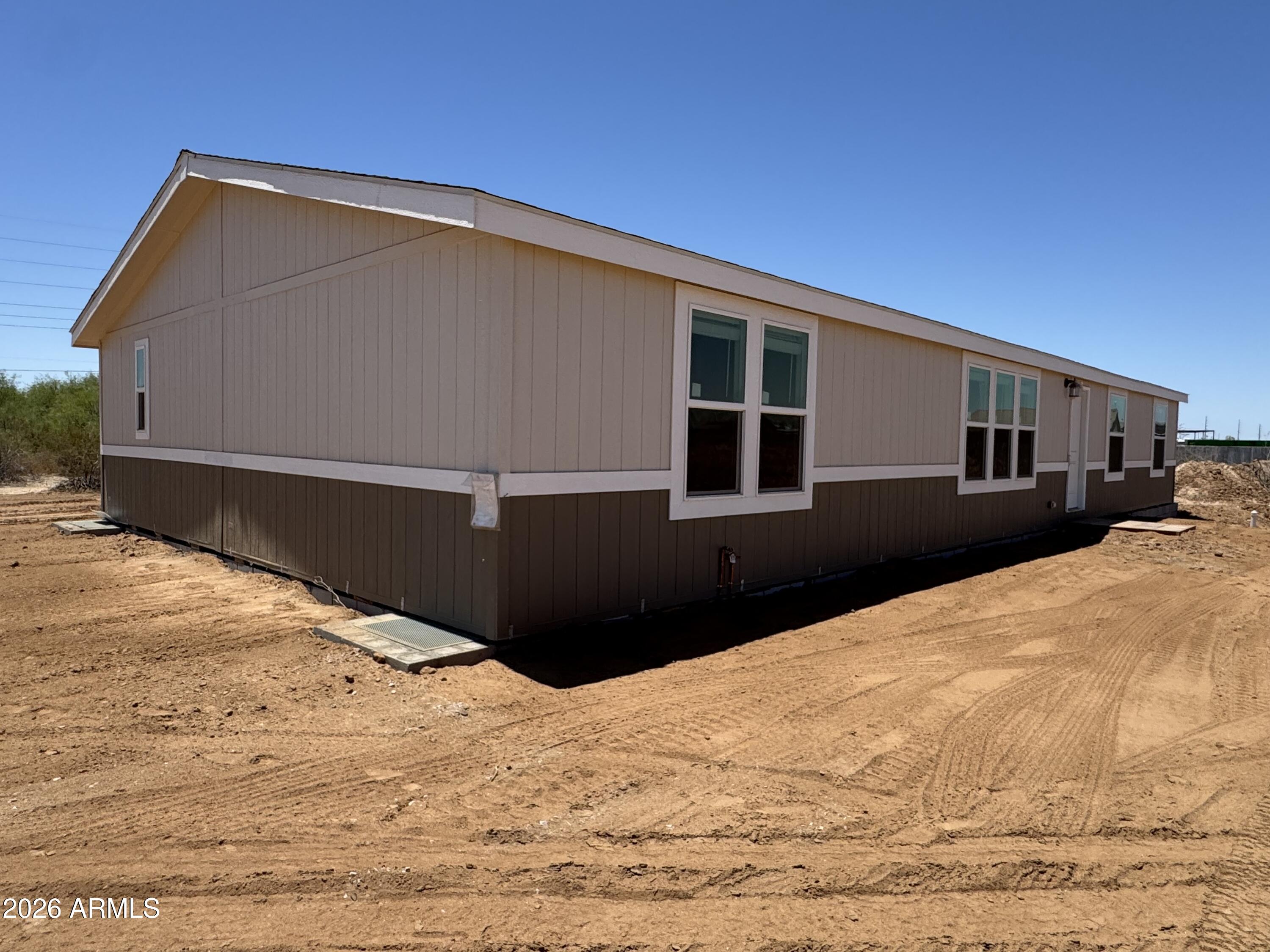 Brand-new home on 1.41 acre lot. No HOA. Go under contract before the home is completed and get $10,000 towards interest rate buy down and/or closing costs on this 4-bed, 2-bath, 2046 sq ft beauty. This home offers an open split floor plan with a great room that opens up to the kitchen and dining areas. The kitchen features an island with extra storage, cabinet pantry, upgraded marble pattern counters, new premium  Whirlpool stainless steel appliances including fridge, microwave & dishwasher and farmhouse sink. Primary suite includes dual sinks & walk-in closet. Blinds on the windows and decorative 6 panel doors.  Vinyl Dual Pane Low E windows. Vaulted ceilings.  Exterior paint is two tone with white trim. Aprx completion date of the home is June 2026