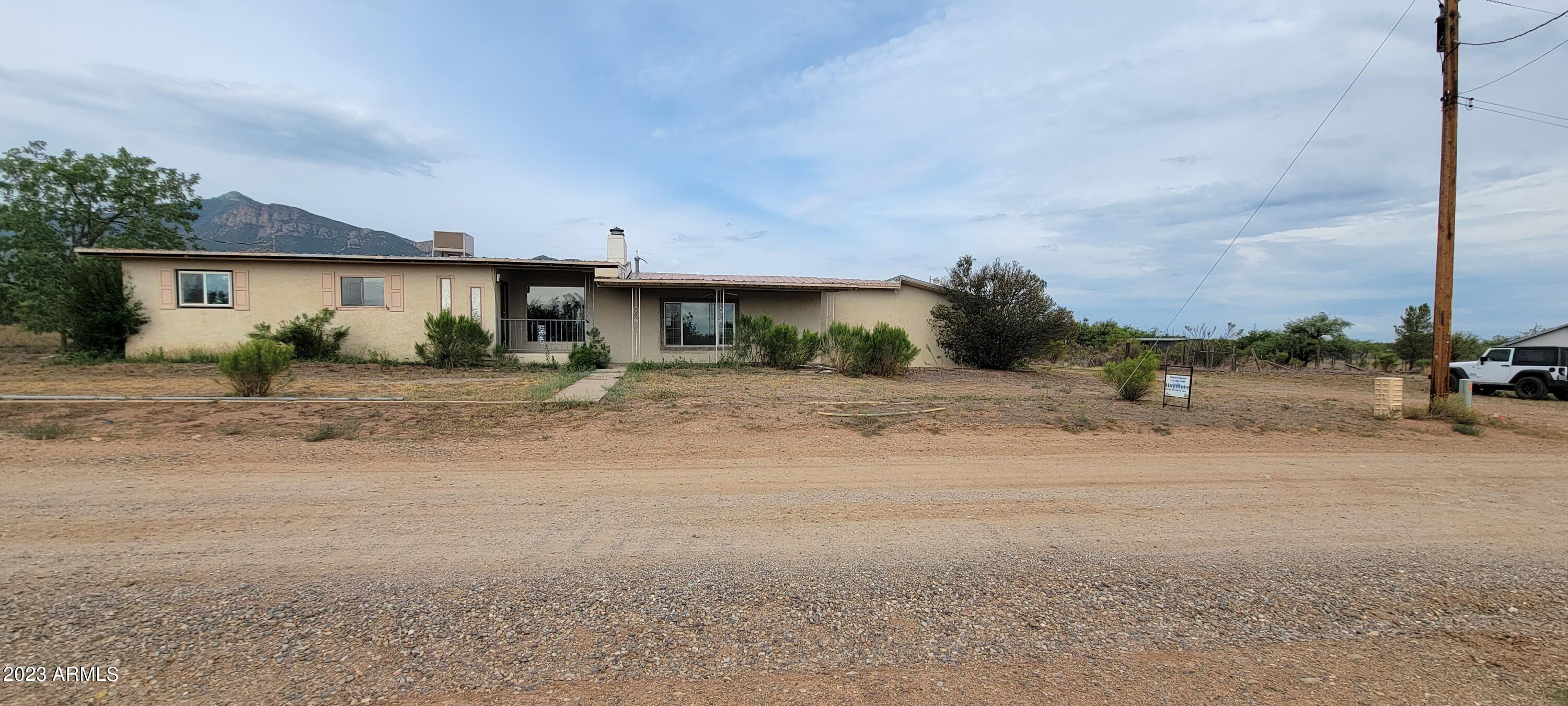 If you are looking for a fixer or flip, look no further. This home has been cleaned out and some demo done. There is still one existing bathroom, the other is ready to redo. It has 4 bedrooms, a living room with a fireplace, a family room with a fireplace and a 2 1/2 car garage or more. The property is almost 2 3/4 acres and there is a private well. It is also fenced . This is a great opportunity. Cash offers only please. Agents, please see the private remarks. This is an AS IS sale. Te seller will make NO REPAIRS!