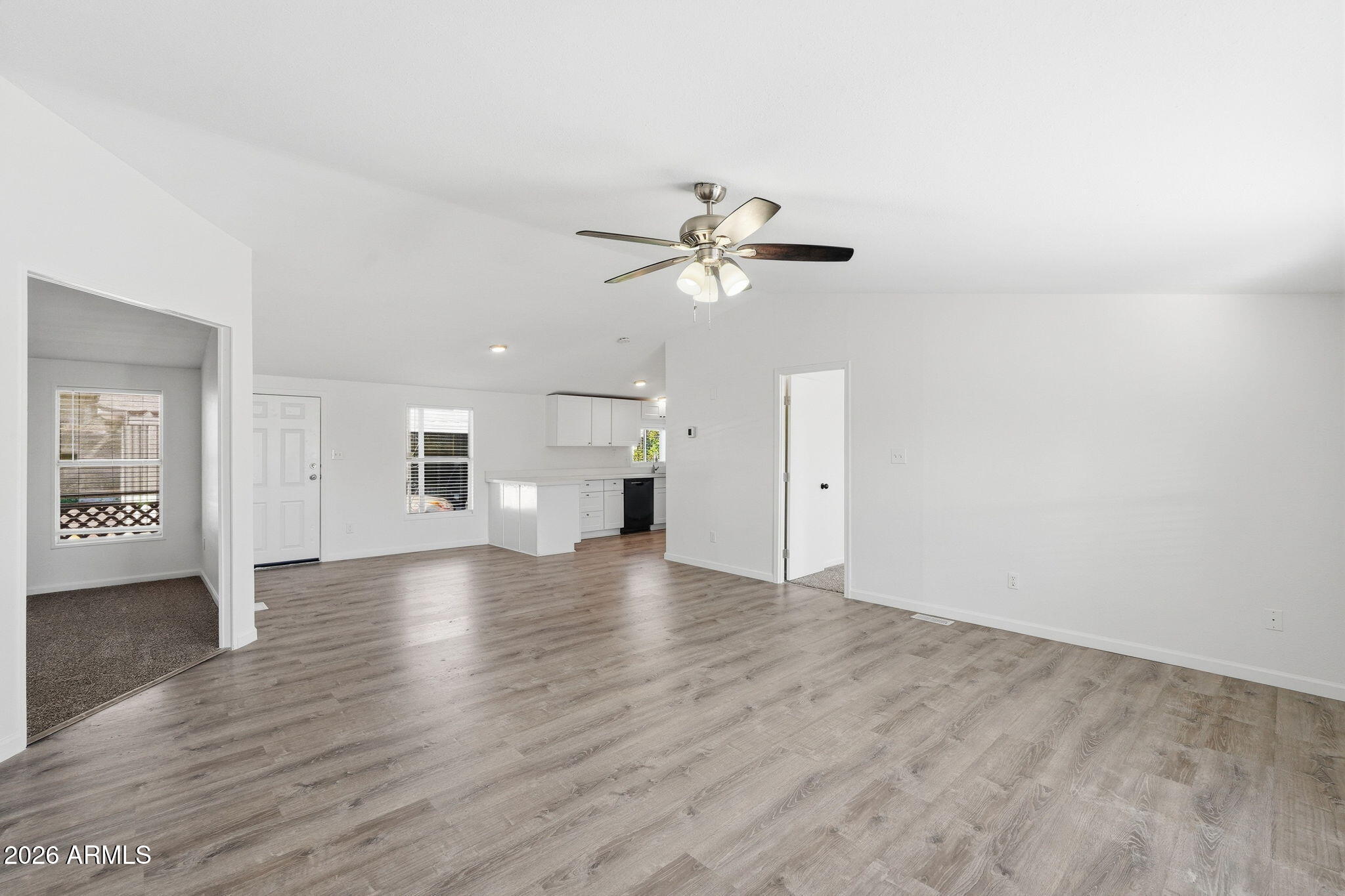 Welcome to this beautifully updated 4-bedroom, 2-bath manufactured home in a desirable All Ages Family Park. Financing available for as little as 5% down! Lot rent includes a $200 monthly credit for three years written into the contract, bringing the rent to just $800 per month. Home is offering 1,904 sq ft of living space. The home features new flooring and fresh interior paint for a clean, modern feel. The spacious kitchen includes brand new cabinets and countertops with plenty of storage. Both bathrooms have also been upgraded with new cabinets and countertops. Appliances include a washer, refrigerator, electric stove, dishwasher, and microwave, making it move-in ready. The property offers covered parking, a covered front porch, storage shed, and backyard space.