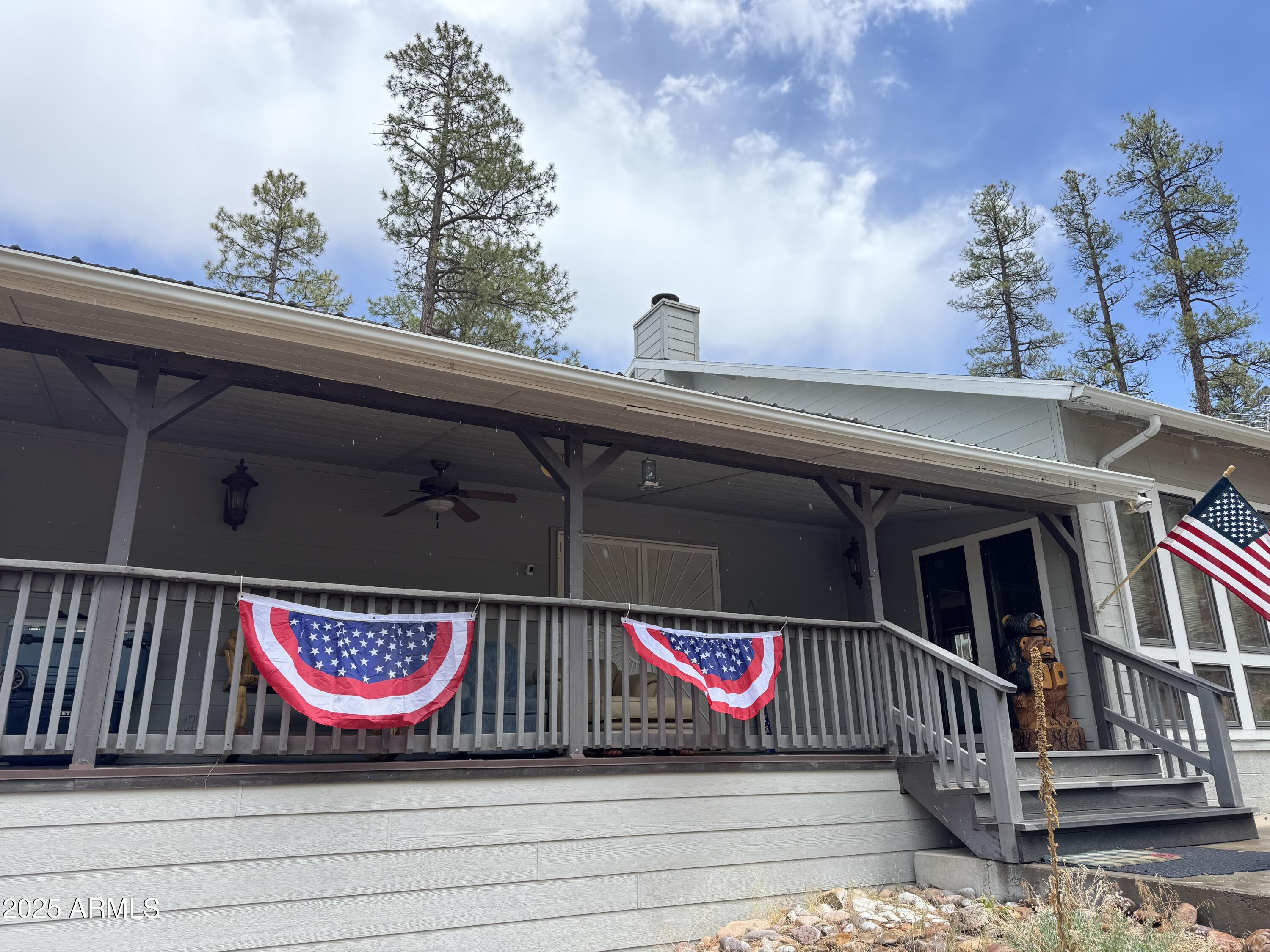 Welcome to your dream getaway in the cool pines of Arizona's mountain country! This beautifully renovated cabin in Heber offers the perfect mix of rustic charm and modern comfort- ideal as a fulltime residence or a vacation escape for the whole family. Step inside to find new flooring , fresh paint, and a smart, open-concept layout that gives priority to the spacious family room, dining area, and kitchen-perfect for the entertaining or simply relaxing by the fire after a day outdoors. An extensive porch greets you and awaits your time playing games or watching the sunset. Designed with a family in mind or ready to house your guests. This cabin offers 3 master suites and an additional full bath off the laundry room. Buyer's to verify all facts and details with the county for themselves.