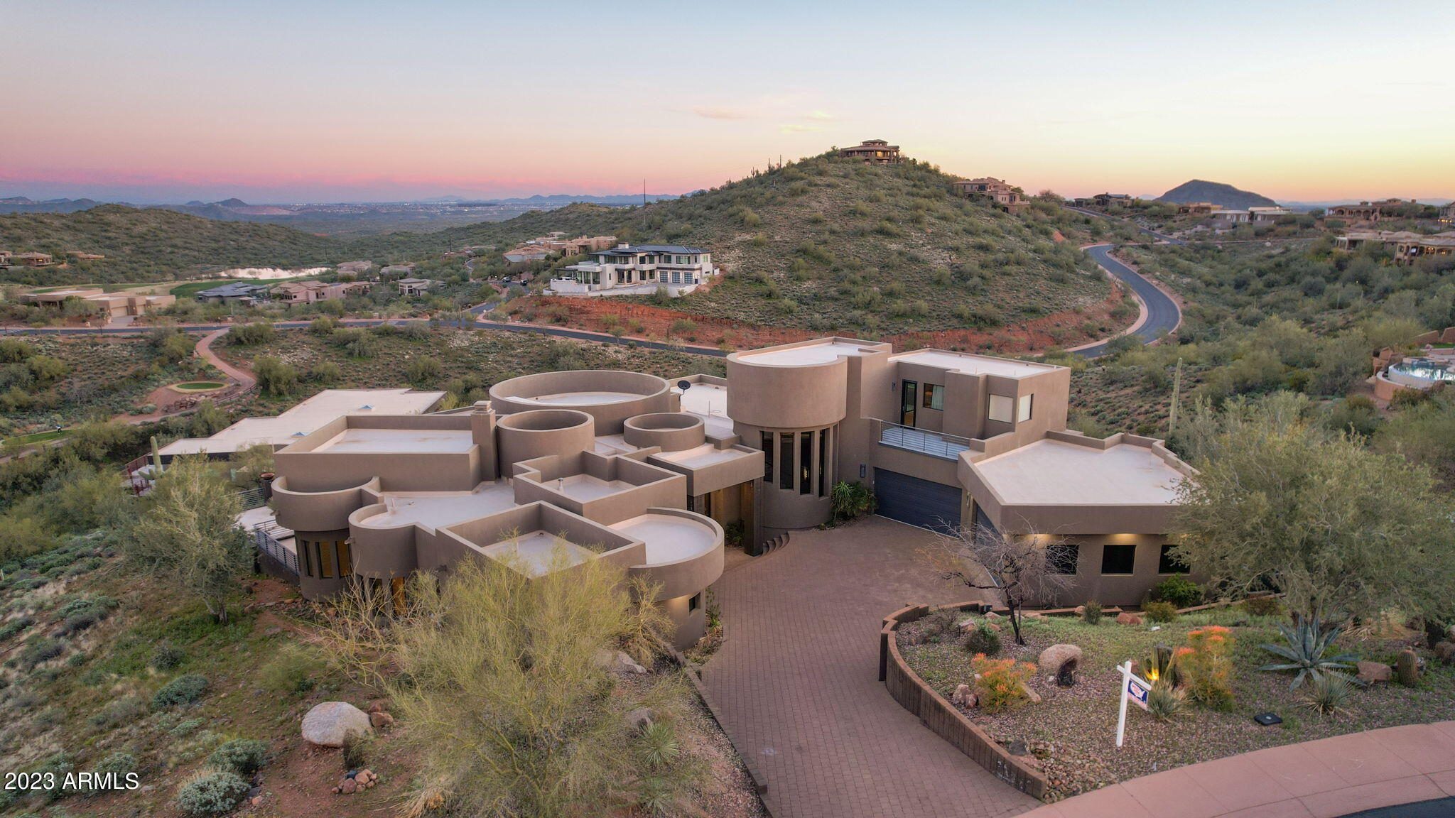CONTEMPORARY MASTERPIECE WITH UNOBSCURED VIEWS OF FIRE ROCK, FOUR PEAKS AND THE GOLF COURSE. THIS HOME FEATURES THE FINEST APPOINTMENTS  INCLUDING A CHEFS KITCHEN, BUTLERS PANTRY, HUGE OWNERS SUITE WITH PRIVATE PATIO AND HIS AND HERS CLOSETS AND RESTROOMS, 4 ADDITIONAL BEDROOMS EACH WITH AN ENSUITE BATHROOM PLUS AND OFFICE AND HUGE ENTERTAINING GAME ROOM AND MEDIA ROOM OR FLEX SPACE. A GREAT FLOOR PLAN FOR A FAMILY AND EASY ACCESS FOR ALL AGES WITH  AN ELEVATOR PLUS A GORGEOUS ZERO EDGE POOL AND SPA WITH FIRE PIT AND COLUMNS WITH FIRE BOWLS.THE VIEWS FROM EVERY PATIO ARE SPECTACULAR. YOU CAN EVEN SEE THE FAMED FOUNTAIN HILLS FOUNTAIN.