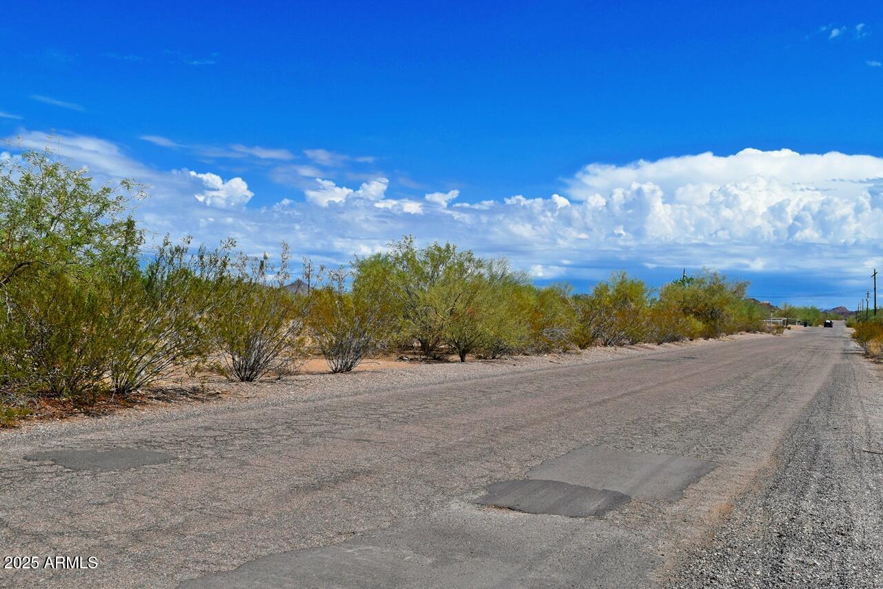 Nice opportunity for a builder to pick up all four lots of a new rural subdivision located in Surprirse on pavement!  Located right along Dale Water line  is already at the property. from Community Water Company.  Area with homes already built, and building envelopes on all of these out of floodplain. Tierra Rico is just down the street.   It is not easy finding single lots in Surprise and this is an opportunity for a builder to get a footprint in one of the hottest regions of the Valley!  Please see survey in documents.   ***One of owners is licensed real estate agent in Arizona****.