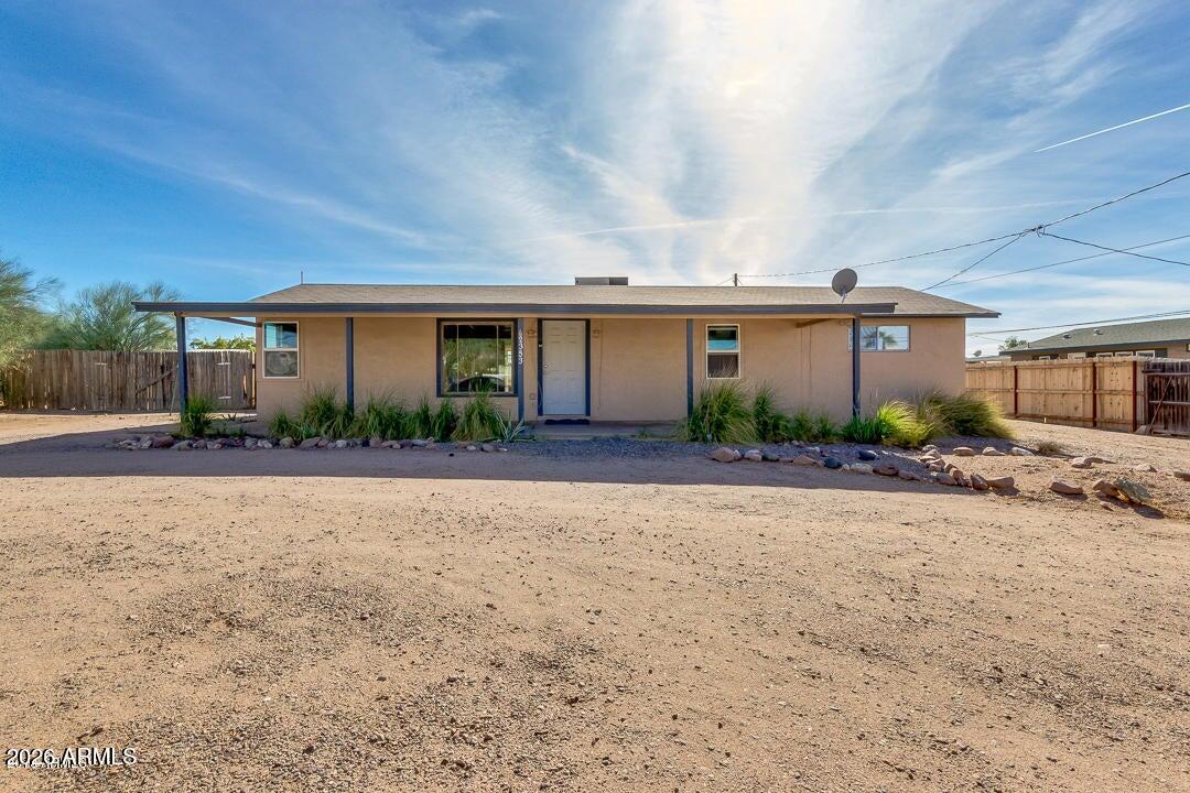 Welcome to this charming Apache Junction property featuring 2 bedrooms and 1 bathroom, offering comfort, character, and incredible versatility. Inside, you'll find durable tile flooring throughout, a spacious living area with unique wood accent walls, and a bright kitchen with an adjacent dining space. The primary bedroom provides built-in shelving for added storage and convenience. Step outside to enjoy the enclosed patio, a storage shed, and a backyard ready for your personal touch. The detached rear home creates a fantastic opportunity for rental income, multigenerational living, or a private guest space. Don't miss your chance to own this unique property with endless potential!