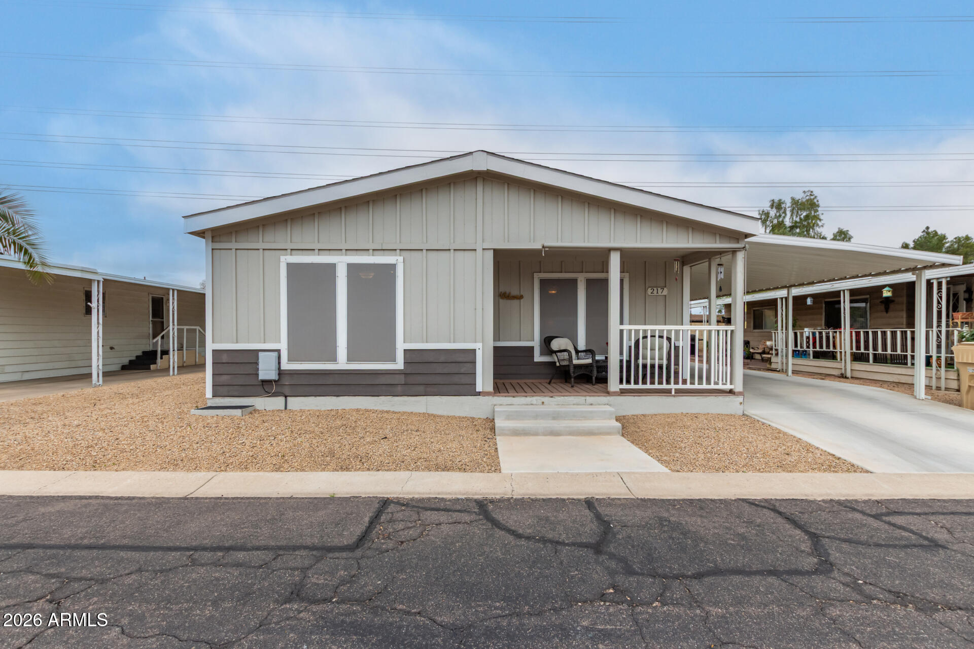 Beautiful 2019 home in the gated 55+ Casa del Sol East community! This 2 bedroom with walk in closets, 2 bath residence offers 1,173 sq ft of modern, move-in-ready living space and stands out as one of the newer homes in the neighborhood. The open-concept layout features a spacious kitchen that flows into the living and dining areas, ideal for everyday living and entertaining.