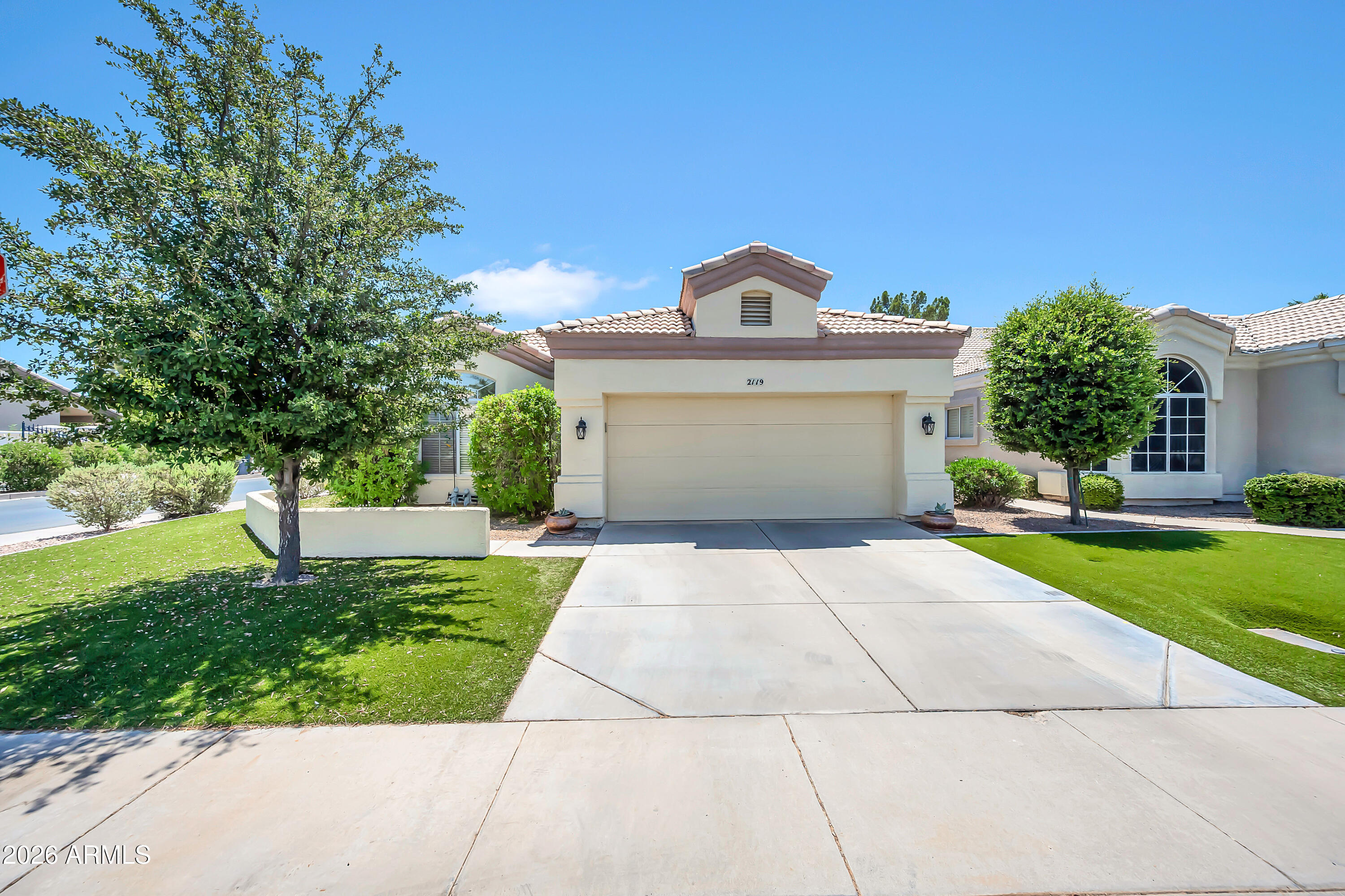 Val Vista Lakes GEM! Located in the secure, gated Castaway Bay enclave within one of Gilbert's premier communities. This bright, open corner home features vaulted ceilings, light neutral finishes, and a spacious bonus den/office. The kitchen boasts ample prep/dining space and abundant cabinetry. Enjoy a private primary suite with a dual-sink bath, separate shower/tub, and great storage. Outside features a covered patio, natural grass backyard, low-maintenance front turf, and energy-efficient E/W exposure. Access resort-style amenities: a luxury clubhouse, fitness center, tennis/pickleball, and a sandy beach lagoon. Walk/bike to top-rated Gilbert schools; minutes to dining & freeways. The center of life at Val Vista Lakes is the luxurious clubhouse, a social and recreational hub featuring banquet spaces, fitness facilities, racquetball, and tennis. Residents can swim laps in the junior Olympic pool, relax by the tropical lagoon with its sandy beach, or enjoy a picnic in one of the many lush parks. Scenic lakes, walking and biking trails, and a full calendar of community activities--from yoga and Zumba to holiday parties and gardening groups--create endless opportunities for connection and fun.

Real estate in Val Vista Lakes is just as diverse as its lifestyle offerings, with homes ranging from waterfront estates to comfortable single-family residences. Buyers seeking Arizona homes for sale will find an array of options in this well-established neighborhood. With its lakeside beauty, resort-style amenities, and prime location, Val Vista Lakes is a stunning Oasis in the Arizona desert. 

Acreage
900 acres (364 hectares)

Gatehouse
Some neighborhoods within the master-plan are gated for added exclusivity, privacy, and security.

Clubhouse
The Val Vista Lakes Clubhouse is the centerpiece of community life, featuring banquet rooms, racquetball courts, a fitness center, and social gathering spaces.

Tennis
An eight-court championship tennis complex gives players of all levels a place to practice, compete, and connect with fellow residents.

Fitness
A fully equipped fitness center with cardio and strength training machines, plus classes like yoga and Zumba, keeps residents active and energized.

Recreation
Walking and biking trails wind throughout the community, while nearby Gilbert parks like Discovery Park and Riparian Preserve add even more options for outdoor fun.

Golf Nearby
Several top golf courses are just minutes away, including Western Skies Golf Club and Greenfield Lakes Golf Course, offering year-round play for golf enthusiasts.

Lake
The community's most prominent feature is its three lakes, which provide a setting for waterfront homes and recreational activities. While swimming in the lakes is not allowed, residents can enjoy boating (non-motorized), kayaking, paddleboarding, and fishing.

Swimming
Three pools--including a junior Olympic pool and a tropical lagoon pool with sandy beach entry--provide relaxation and fun for all ages.

Area Attractions
From the lively restaurants and nightlife of Downtown Gilbert to the performances at the Hale Centre Theatre and the exhibits at the Gilbert Historical Museum, residents are surrounded by cultural and entertainment options. Nearby cities like Chandler, Scottsdale, and Phoenix add even more excitement with professional sports, concerts, shopping districts, art galleries, and world-class resorts, ensuring there's always something to see and do just beyond the community.

Shopping & Dining
Residents enjoy easy access to a variety of shopping centers and restaurants, including SanTan Village, Dana Park Village Square, and the many dining options in Downtown Gilbert, from local eateries to popular national favorites.

Healthcare
Top medical facilities including Banner Gateway Medical Center and Mercy Gilbert Medical Center are only a short drive from the community.

Airport Access
The community is just 15 minutes from Phoenix-Mesa Gateway Airport and about 30 minutes from Phoenix Sky Harbor International Airport.

Homes For Sale
Priced from the mid $300,000s to $2 million+