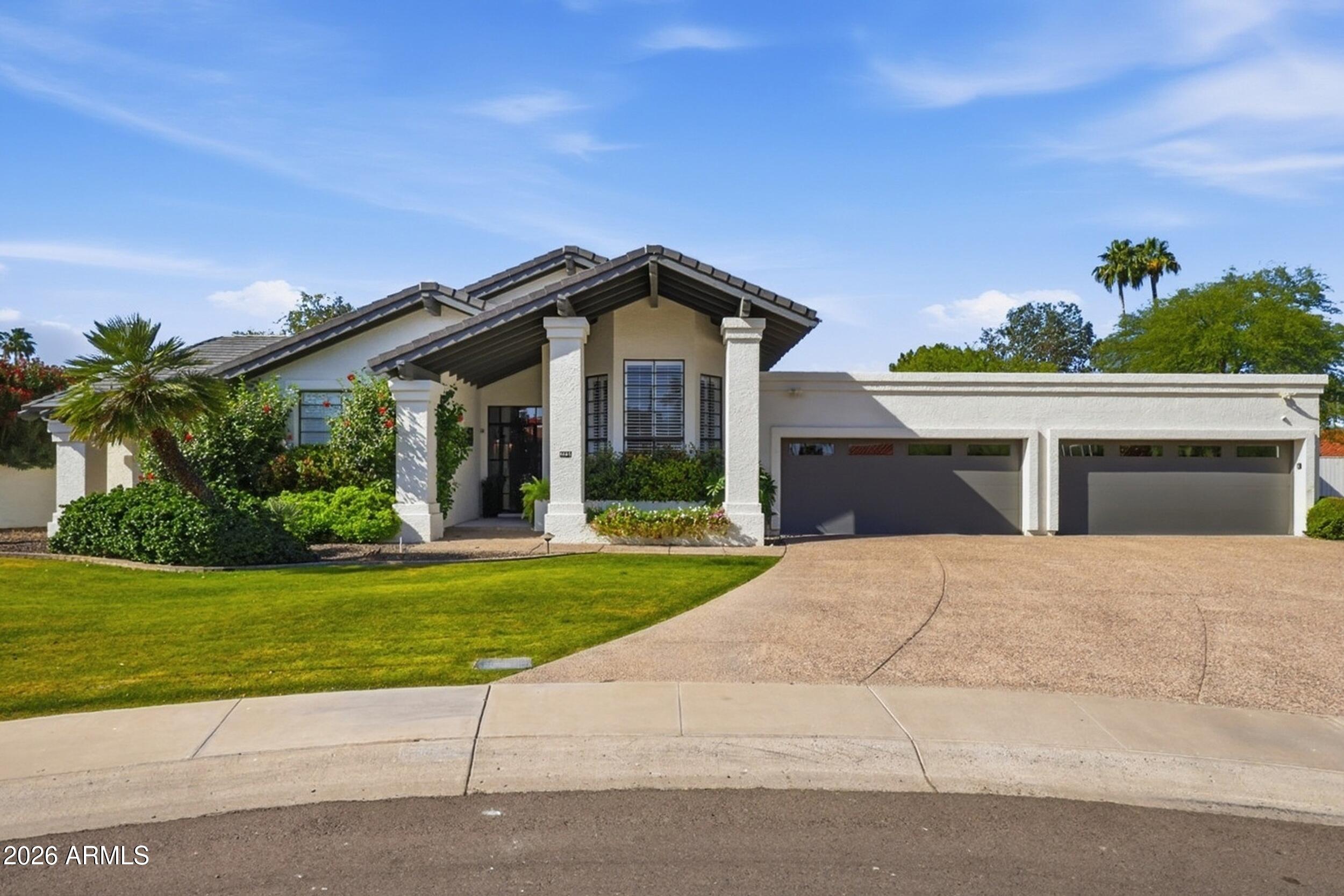 A rare Scottsdale Ranch crown jewel on a 21,078 sq ft cul-de-sac lot with an adjacent wash providing natural privacy. This one-of-a-kind 5 bed, 3.5 bath home offers space, style, and flexibility. Two living areas, updated kitchen, two fireplaces, office/podcast loft, and a bright exercise space off the primary suite. Two laundry areas and a 4-car direct entry garage with built-in cabinets add everyday ease. Warm details and curated finishes create timeless comfort in one of Scottsdale's most desirable neighborhoods--minutes from shopping, dining, lakes, parks, and community amenities.