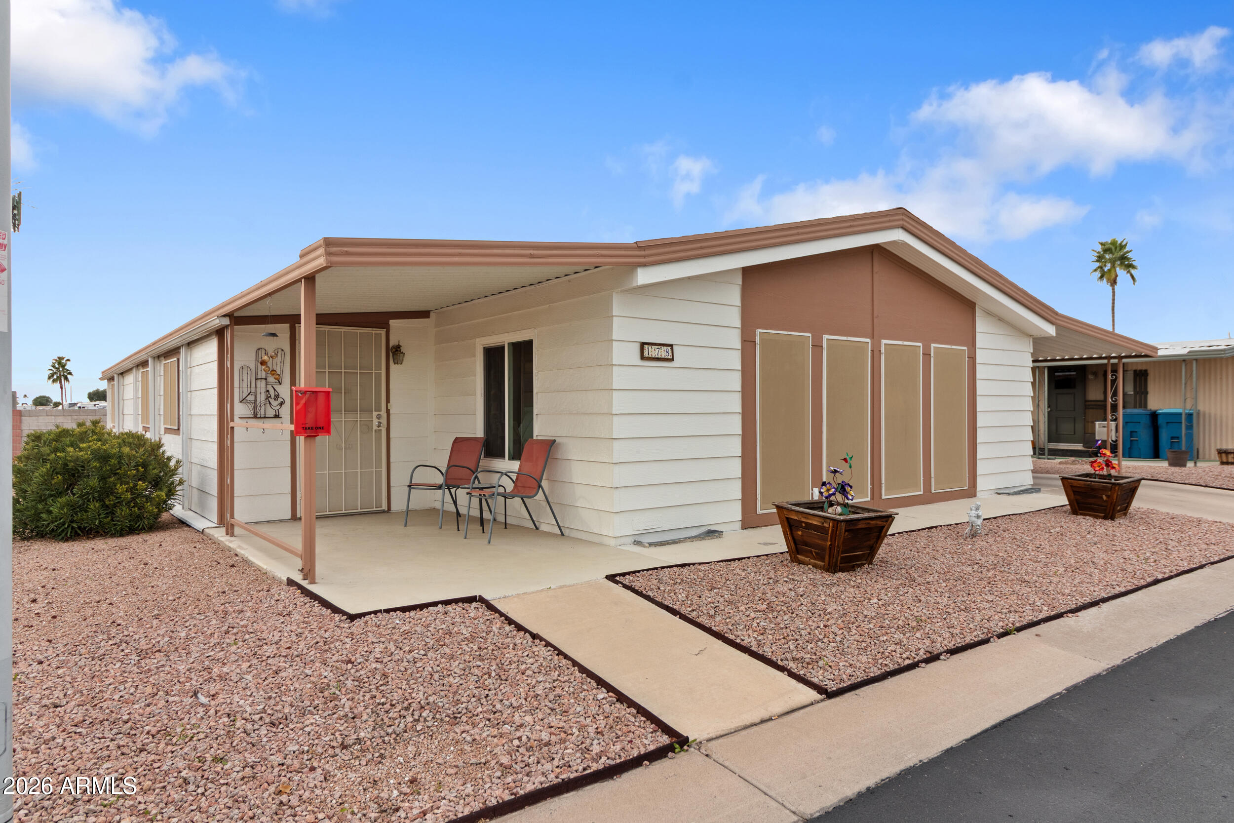 REDUCED***GROUND SET***WELL CARED FOR/MAINTAINED UPDATED 1983 KAUFMAN AND BROAD 24X56 1344 SQ FT WITH BONUS AZ/LANAI ROOM-WORKSHOP, VAULTED CEILINGS, NEWER DUAL PANE WINDOWS W/SHADES,COMP SHINGE ROOF, CENTRAL A/C UNIT APPROX 5 YEARS AGO, NEWER KITCHEN CABINETS,RO SYSTEM, OWNED WATER SOFTNER ,LIGHTING, FIXURES AND FLOORING,MASTER BEDROOM HAS WALK IN CLOSET,MASTER BATHEROOM WALK IN SHOWER,GRAB BARS,RAISED TOILETS,TANDEM 2 CAR COVERED PARKING WITH DETACHED STORAGE SHED,FABULOUS ARE THE BEST WORDS TO DESCRIBE HOLIDAY PALMS,AN ACTIVE 55+COMMUNITY IN MESA'S EAST VALLEY.ENJOY OUTDOOR RECREATIONAL ACTIVITIES ALL YEAR LONG,INCLUDING NEW PICKLEBALL COURTS,SHUFFLEBOARD.PRIVATE GATED COURYARD CONTAINS AN OUTDOOR HEATED POOL & WHILPOOL SPA SURROUNDED BY SHADED LOUNGE CHAIRS,RECLINERS & PET PARK