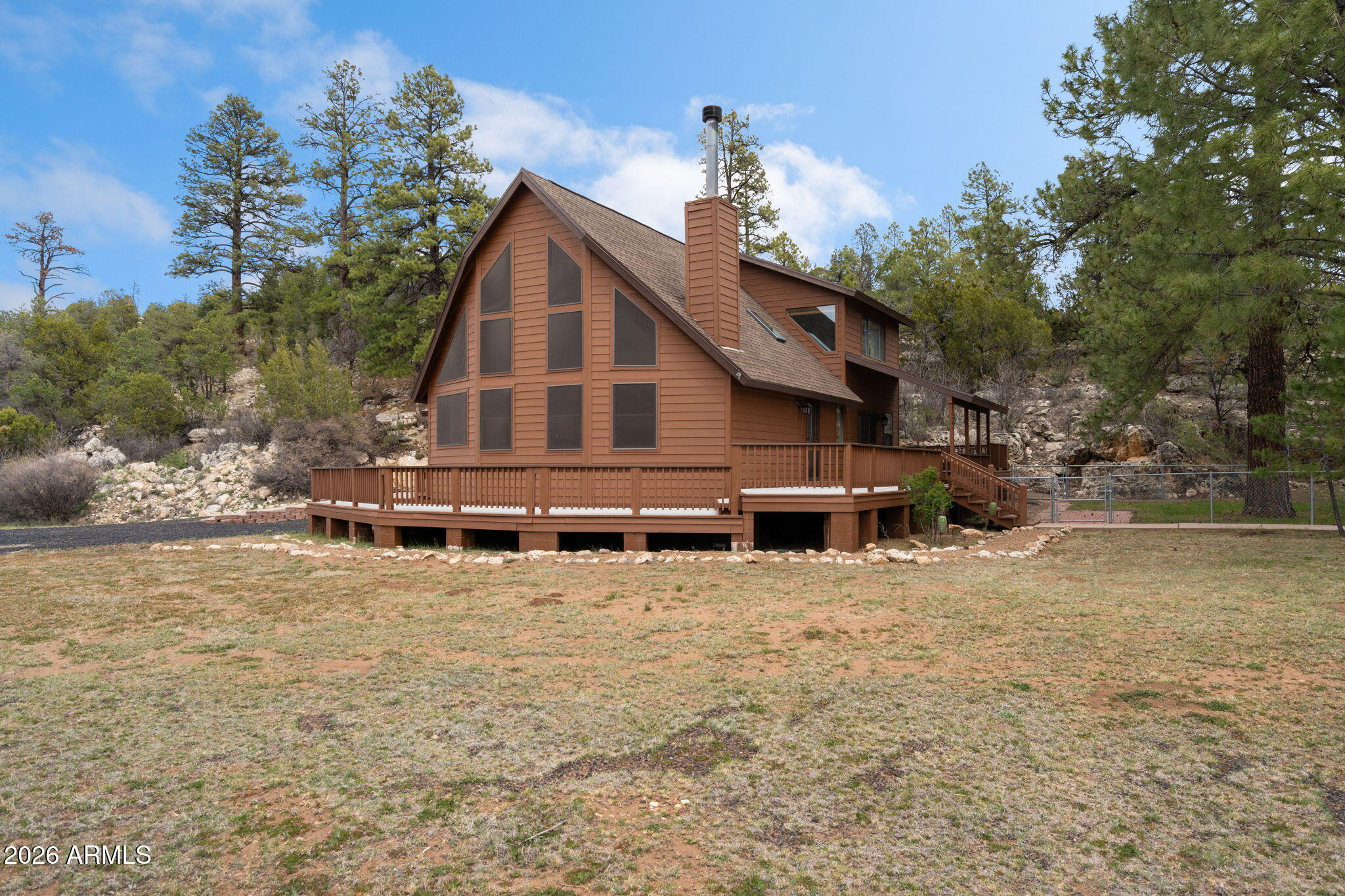 Nestled in the heart of Heber, AZ, this incredible property sits on 3.505 acres in one of the most peaceful and scenic locations in the area. Surrounded by natural beauty, the property features a bluff behind the home and a seasonal wash running along the front, creating a truly serene mountain setting.
The home offers 3 bedrooms, 2 bathrooms, and an attached 2-car garage, plus an impressive detached 4-car garage with a small loft above--perfect for extra storage, a workshop, or hobby space.
Even better--this property was originally two separate parcels that have been combined, and the second lot already has electric and septic installed...opening the door for a guest home, shop, or future build.
Peaceful, Private, & with potential. 
If you've been dreaming of the perfect mountain geta