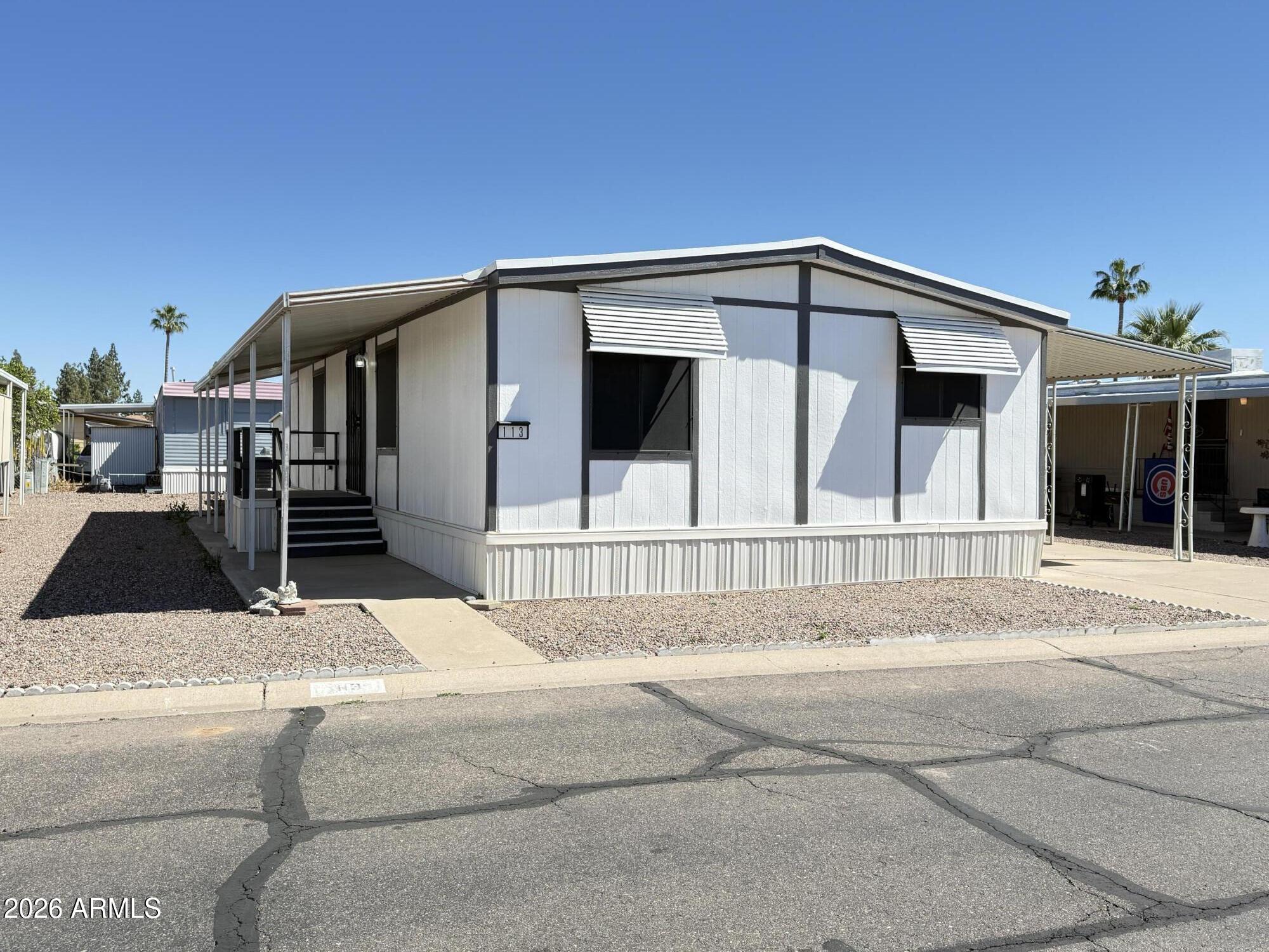 Beautiful inside and out! This remodeled home has it all! Updates include: Newer A/C, 2 new dual-pane windows, 5 windows with 5% ceramic heat shield tint, roof, and fresh exterior paint. Inside, wood-plank-look vinyl floors throughout complement a gorgeous two-tone palette. The designer kitchen features upgraded soft-close cabinetry, attractive quartz countertops, an island with built-in electric, and top-of-the-line stainless steel appliances. The electrical and plumbing systems have been updated, giving you peace of mind. The primary suite features a fully renovated bathroom with a custom Delta ProCrylic shower, a stylish vanity, a mirror, and modern fixtures. Add in upgraded lighting, multi-function ceiling fans w/ remotes, and modern finishes, and this home is ready for move-in!