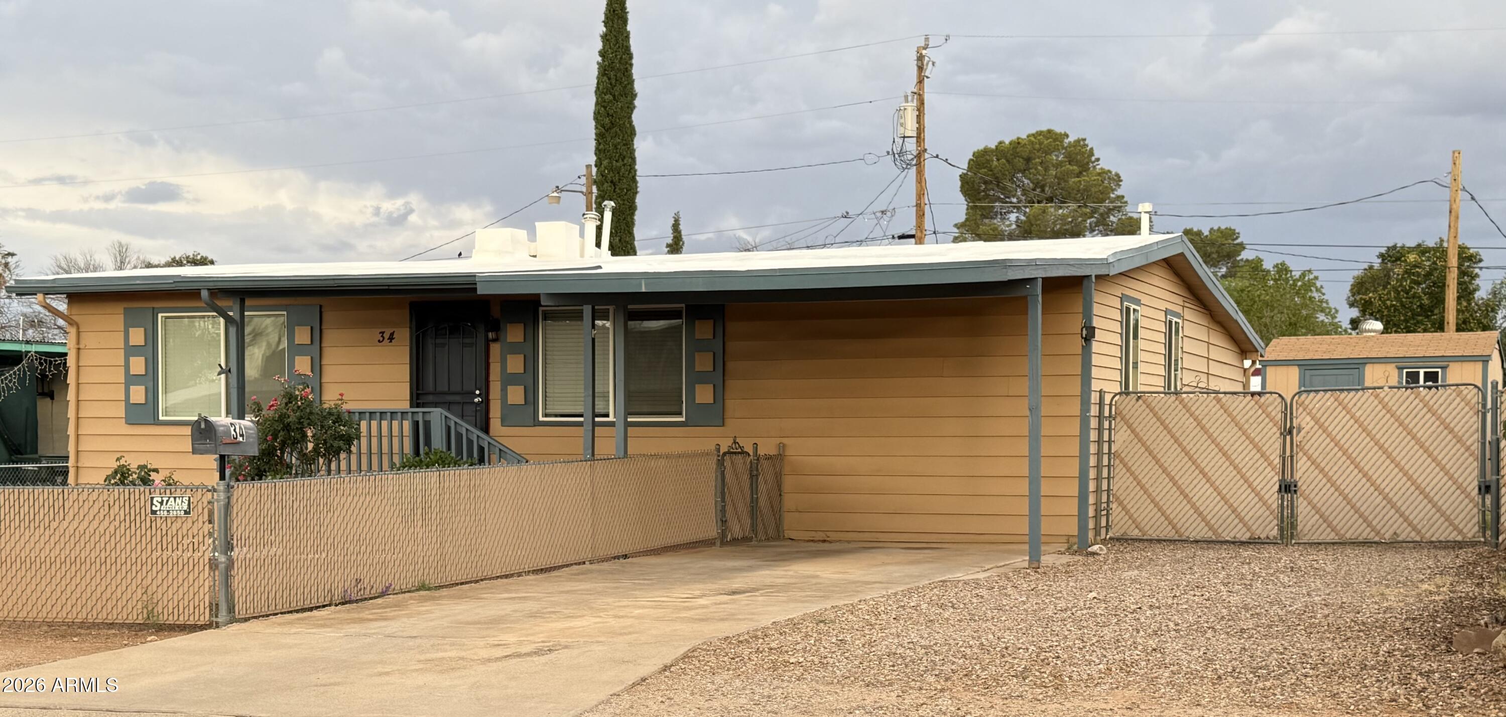 Move right into this beautifully remodeled and charming home! Updated in 2018, it features 3 bedrooms and 2 baths with a versatile floor plan. Two bedrooms and a bath are located on one side, while the spacious primary suite offers privacy and comfort. The updated kitchen includes newer cabinets, tile backsplash, stainless steel appliances, and a breakfast area. A large bonus room can serve as a family room or formal dining space. Additional upgrades include wood floors, newer windows, HVAC, and custom wall finishes. Enjoy the covered patio, storage shed, RV parking, and covered carport. A wonderful home you won't want to miss!