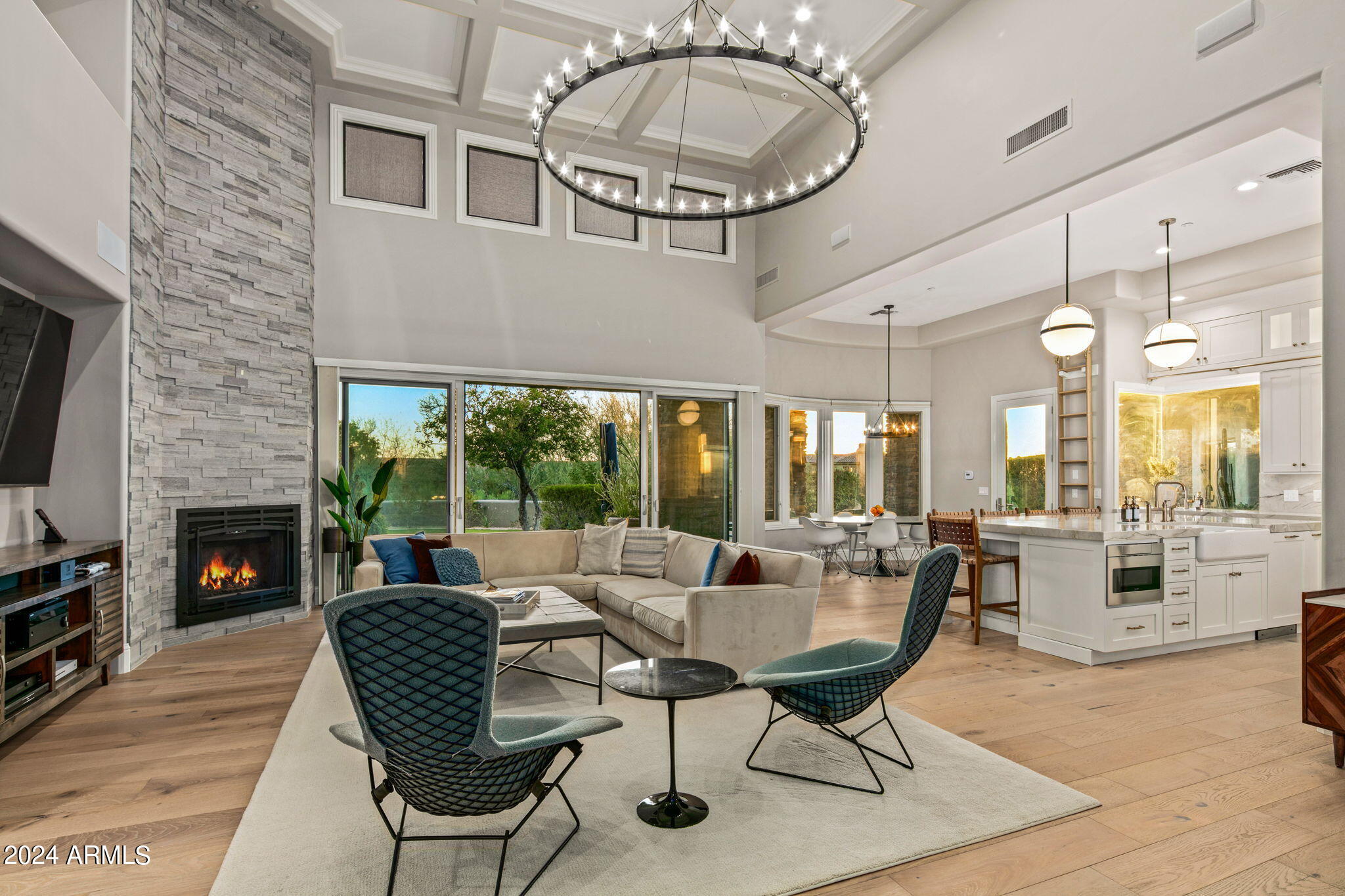 Extraordinary DC Ranch Contemporary showcasing a stunning new dream kitchen & wide planked oak floors on a secluded cul-de-sac boasting south facing views of the city lights, sunsets & surrounding mountains.  The spacious elegant great room plan offers 6 ensuite bedrooms beautifully executed with custom finishes, powder room & pool bath.  Incredible indoor/outdoor living spaces including 2 large covered shaded patio areas, pool, spa, waterfall, firepit complete with covered gas BBQ area.  The charming front courtyard has a beautiful new gate plus a new grand wrought iron front door. The intelligent floor plan begins with an impressive foyer with soaring ceilings & an enclosed family room, formal dining room. butler's pantry w bev refrig, wet bar & ice maker. Primary suite has two-way fire fireplace, large closet with cedar storage & extra-large soaking tub. The serene backyard, adjacent to open space is quiet & private. Photography coming soon.