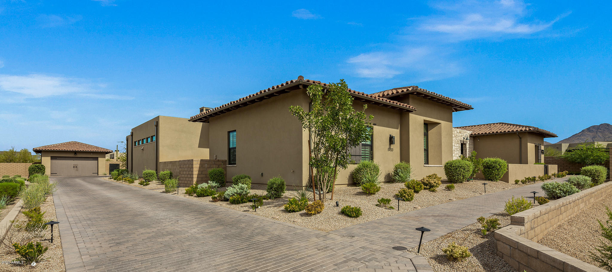Simply stunning soft contemporary home built by award-winning Camelot Homes. This home exemplifies indoor/outdoor living--the courtyard space is another ''room'' in this incredibly flexible floor plan. The main house features a large great room, master bedroom suite and 2 secondary bedrooms, each with private bath and walk-in closet. Need a private office? Exercise Room? 2 offices? Additional family room or game room? Guest House with separate entrance? Large craft room? Pool and Spa? Plenty of Storage? A private yard with room to run or practice golf? This home has the flexibility to accommodate all your wishes. Beautiful neutral high end finishes all on a single level + 4 car garage. Move right in and enjoy this barely lived in home. Fabulous gated North Scottsdale location.