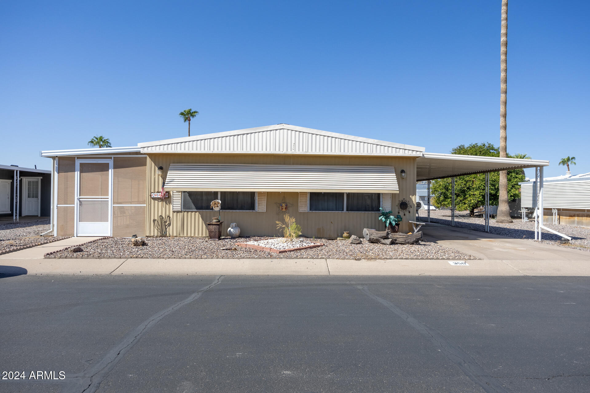 This charming fully furnished home is ready to be loved and enjoyed.  It has 2 spacious bedrooms and 2 bathrooms!! It features a wonderful floorplan and beautiful and bright kitchen!! Enjoy your coffee  in the spacious Arizona room and spend some time enjoying this lively and vibrant community.
