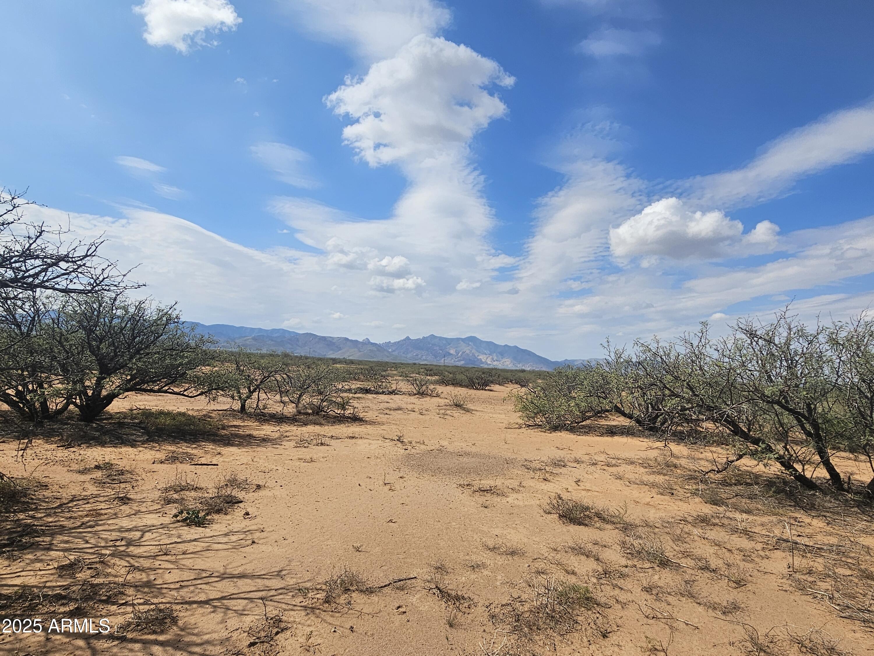 Rare Opportunity: Three Contiguous Lots (2.5+ Acres Total) in Pearce, AZ!
Secure your future investment with this unique offering: three adjacent lots, totaling 2.514 acres (0.838 acres each), sold together as a single bundle!
Located near E Cloudburst Road and S Lasing Road, these properties offer stunning mountain views and feature a regular shape, making them ideal for development. Zoned SR-22, this combined acreage provides excellent flexibility for building multiple custom homes, creating a family compound, or holding for future resale. Don't miss this chance to acquire over two and a half acres of prime high-desert land with unbeatable potential!