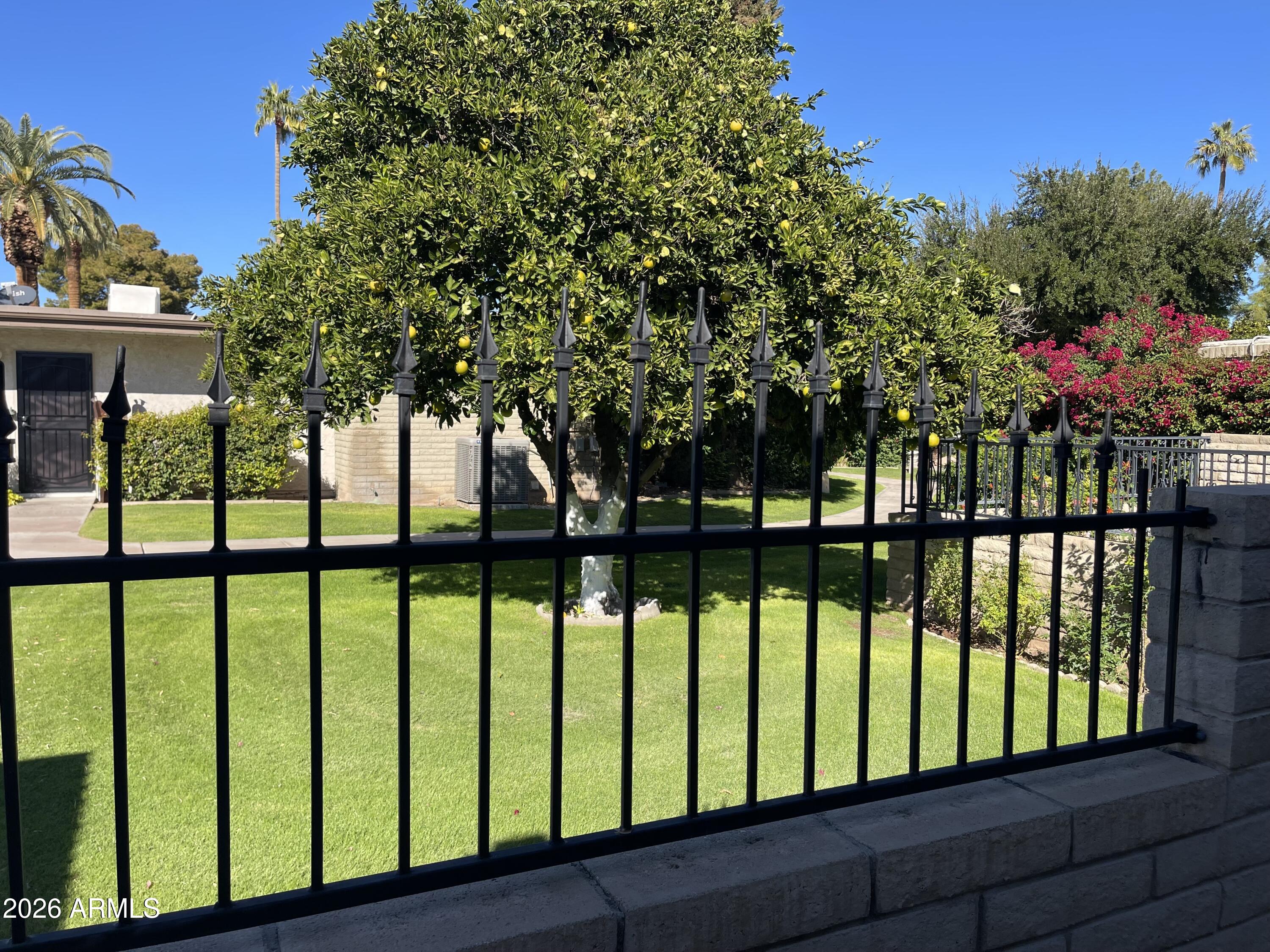 This bright, white, cozy one bedroom condo is ready for move in! Make it your own it's a blank slate. There is tile throughout living area and newer carpet in the bedroom.  The condominium is located in middle of the complex for privacy. Walking distance to Fashion Square and downtown entertainment in Old Town.  Special community with manicured grass, flowers, guard gate, pool, spa, gym, laundry, salon with restaurant, bar and clubhouse.  Walking paths throughout the property.  Please review HOA and Land lease fee requirements . Don't miss this special condo!