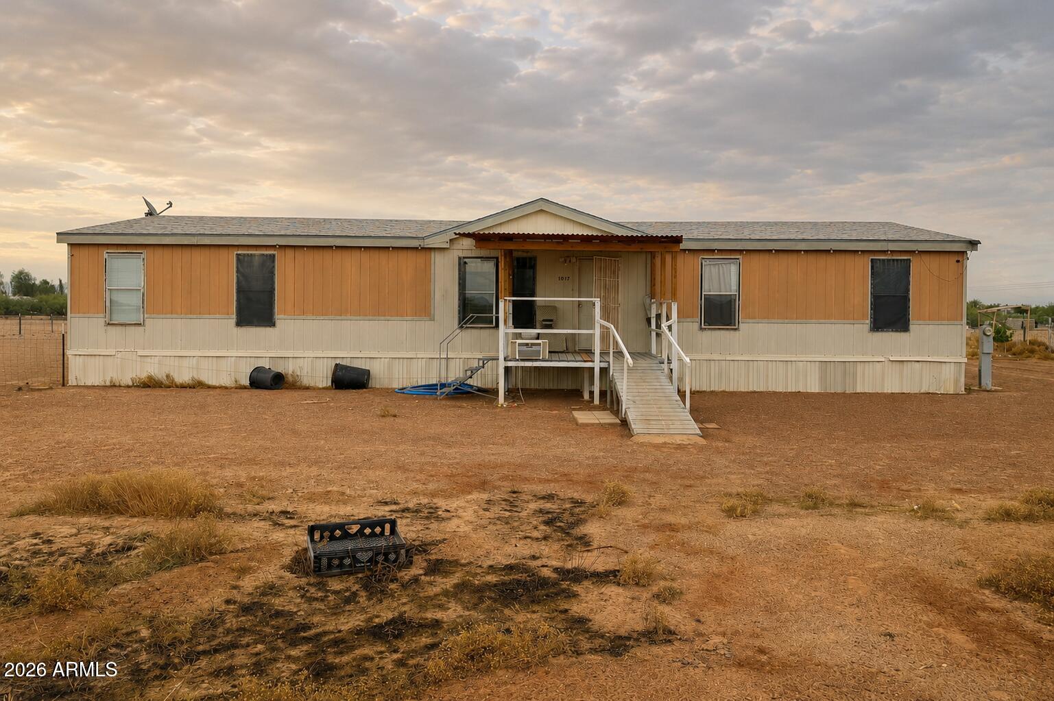 1.25 acres, a brand new HVAC unit, and a private water well -- this Tonopah property is already ahead of the game. Escape the city and settle into the peace and quiet of wide open desert living, complete with breathtaking mountain views right outside your front door. Inside, the open Great Room concept connects the kitchen and family room seamlessly, making entertaining a breeze. The oversized primary suite features vaulted ceilings, a garden tub, separate shower, double sinks, and large his-and-hers walk-in closets. Two additional spacious bedrooms offer generous high closet storage. The fully fenced backyard includes dual gate access on both sides -- perfect for toys, trailers, RVs, and more.