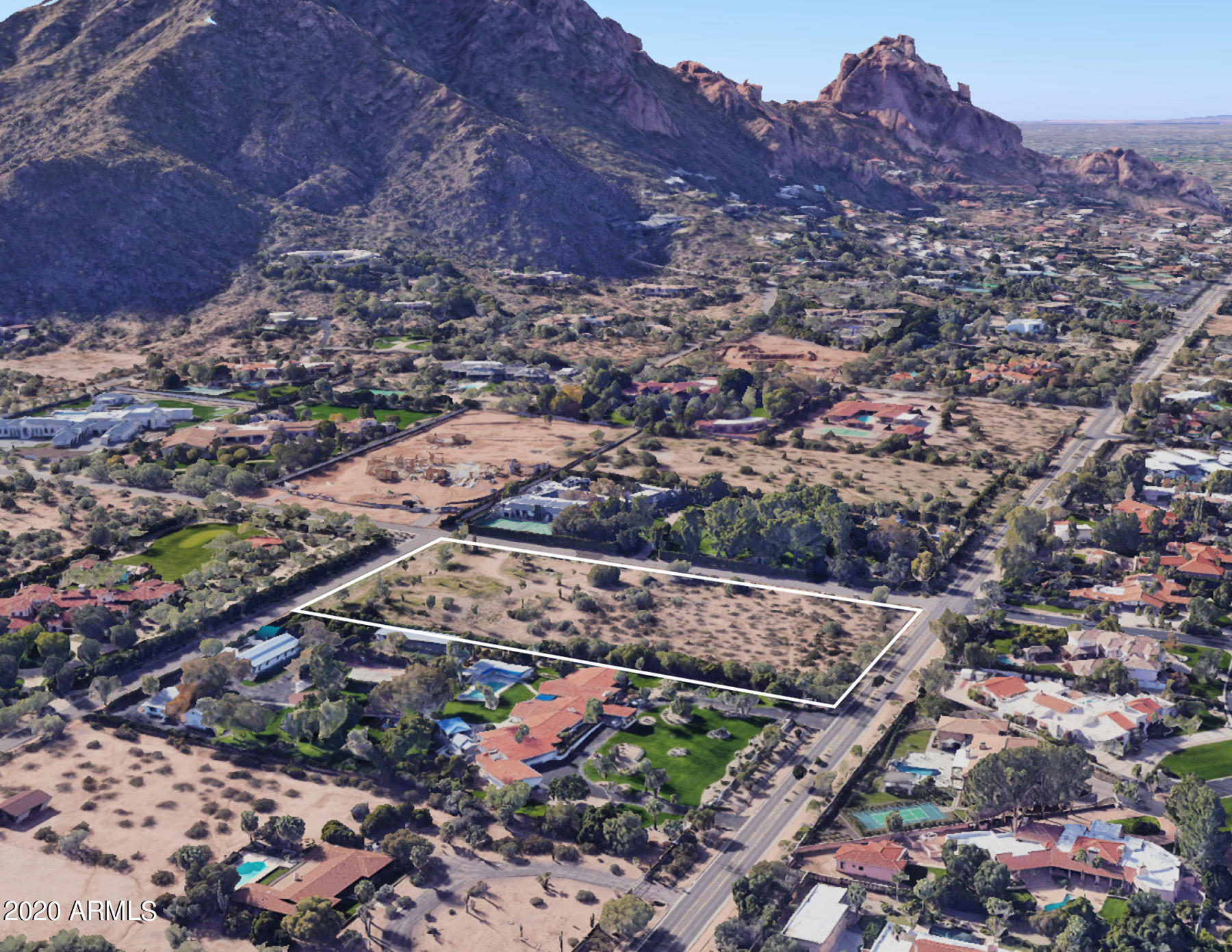 Phenomenal view Lot ready for your creative and original dream home in prestigious CAMELDALE, the jewel of Paradise Valley!  With North/South orientation, this 4.44 Acre lot has picture perfect, magnificent views of Camelback Mountain and the Praying Monk to the South and Mummy Mountain to the North. Private and in good company with surrounding luxury neighborhood Estates, this lot is in the heart of everything from fine dining, top resorts such as The Sanctuary and the new Mountain Shadows, to Paradise Valley Country Club and the iconic El Chorro. This is a special opportunity to acquire a very buildable view lot with acreage in one of the finest and most exclusive locations in town.