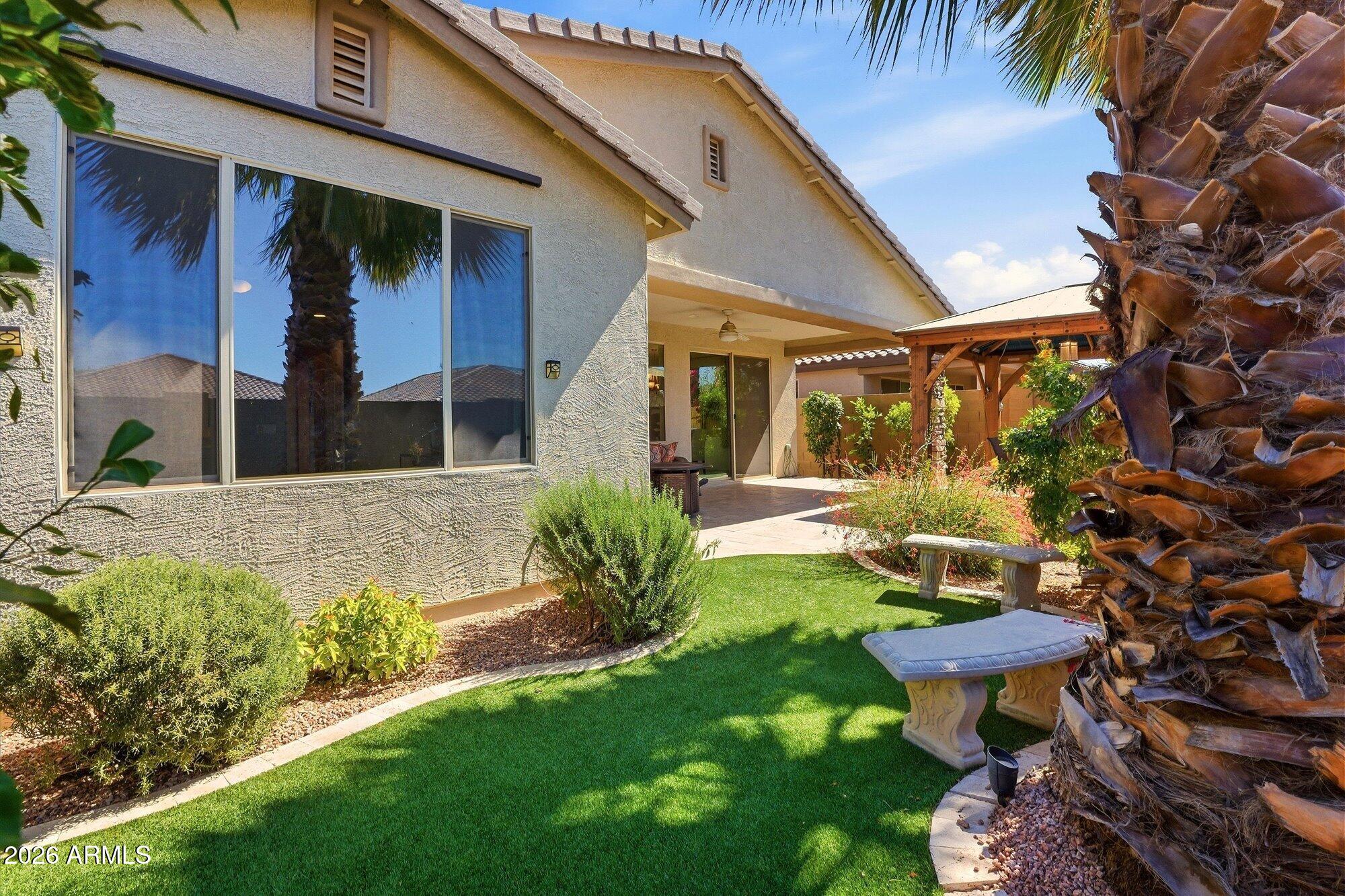 PAID SOLAR! This inviting home offers an open floor plan with tile flooring in the main living areas & carpet in the den & bedrooms. The beautiful black granite countertops pop against the light gray cabinets & oversized kitchen island. Your primary suite includes a 3-foot extension creating a more open feel a huge closet and a gorgeous bathroom featuring a soaking tub & tiled walk-in shower. A flexible den space gives you an added space for an office or hobbies. The buyer receives the additional benefit of a paid-off solar w/pigeon proofing & a water descaler system. Enjoy your relaxing backyard with a gazebo & expanded travertine patio, perfect for enjoying AZ's beautiful weather. This home provides you a this rare opportunity to live in the highly sought after 55+ community...Sun City.