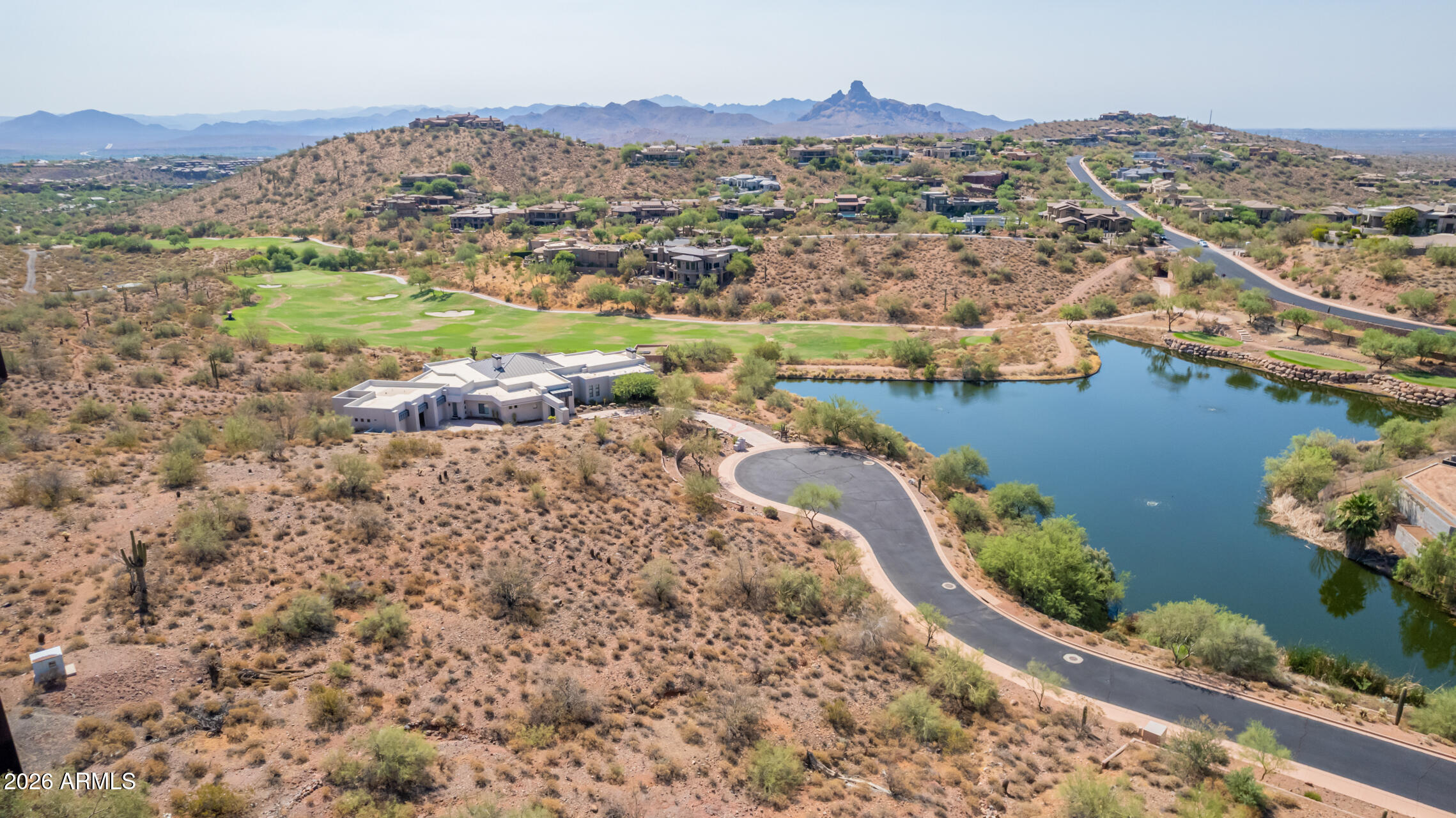 Prestigious Guard Gated Golf Community in Fountain Hills with 24 Hour Security. Nestled in a Serene Cul-de-sac in the Desired Firerock Community, this 1.47-Acre Gently Sloping NS Custom Home Lot offers Breathtaking Views of the Tranquil Lake, Golf Course, and the McDowell Mountains. Surrounded by Multi-Million Dollar Homes this Lot has an Expansive Terrain that provides a Blank Canvas for you to Design and Build your Dream Home. Firerock Country Club offers Membership and Upscale Amenities Including an 18 Hole Championship Golf Course, Pool, Clubhouse, Fitness Center, Tennis, and Pickelball Courts.