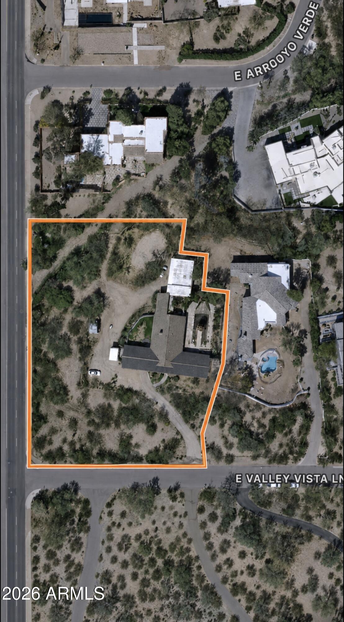Attention Builders & Investors: Exceptional 1.6+ acre Paradise Valley opportunity just two blocks from Camelback Mountain, featuring unobstructed, breathtaking views and city sewer already connected. Surrounded by ultra-luxury estates, including multiple new construction homes exceeding $10M and a neighboring teardown that recently sold for $3.97M. Enjoy panoramic views of Camelback Mountain, Mummy Mountain, and the Phoenix Mountain Preserve. The current residence is being sold as-is, with no HOA restrictions. Consider a rooftop deck to maximize the extraordinary sunset and city-light views. This is a rare chance to create a world-class estate in one of Arizona's most prestigious locations!! Also listed as Land/Lot.
