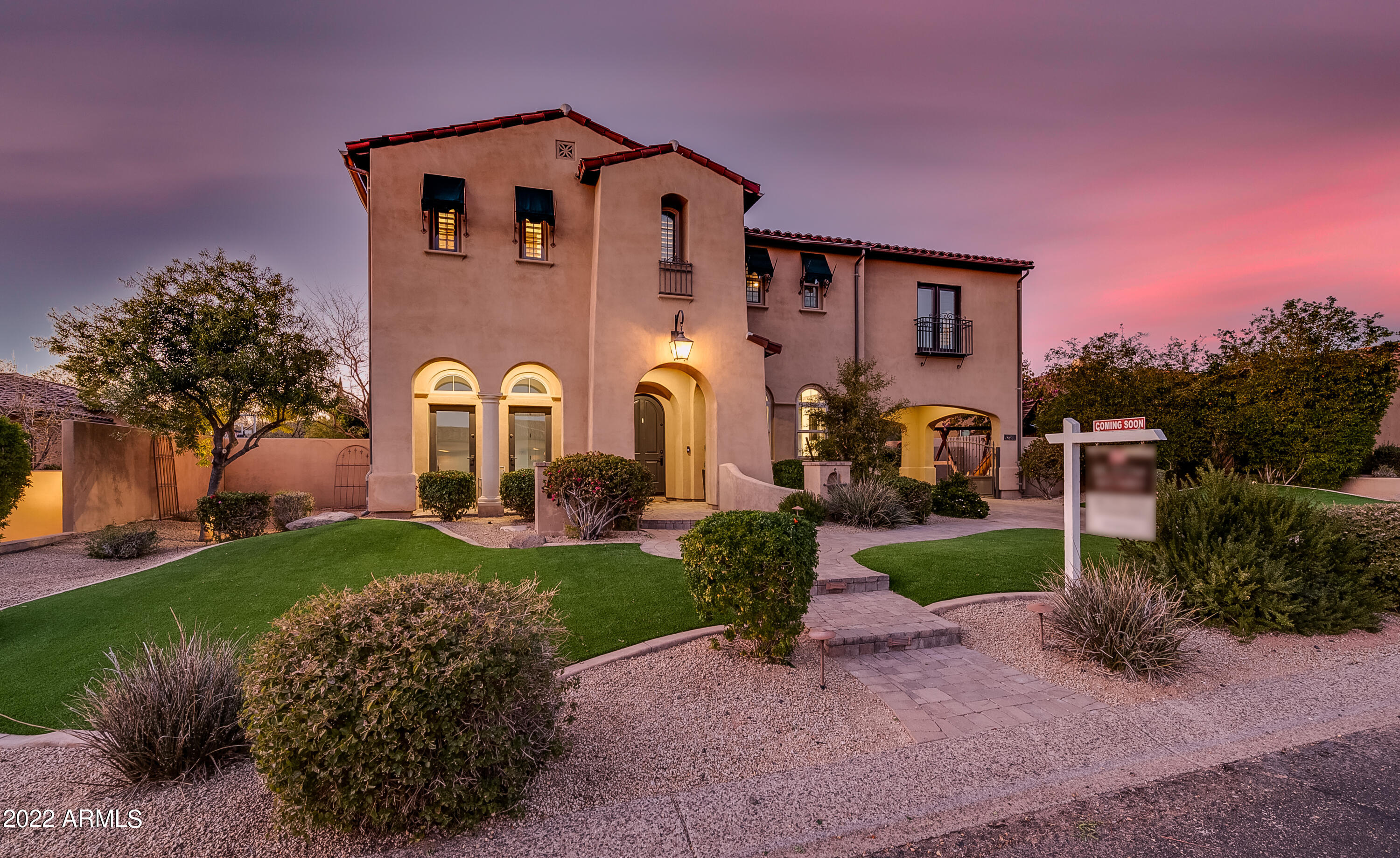 Beautiful Camelot home located in the guard gated community of Firenze @ Grayhawk.  Tastefully updated with modern colors and finishes. Check out the main living area with Pocket doors front and back bringing the outside to the inside. A chef's kitchen to rival anything. Expansive cooking island, quarts surfaces throughout, a commercial grade gas range, all newer cabinetry, lighting fixtures and the list goes on. Cozy courtyard atrium with a gas fire pit. Downstairs has a large bedroom with an En Suite bath. Upstairs you will find the master bedroom plus 3 more bedrooms and your own private movie room. Spectacular private yard with pavers and a Cantera stone accented pool & spa. Pebble-tech pool with falls, Baja relaxation step, Built in BBQ center and an outdoor fireplace.