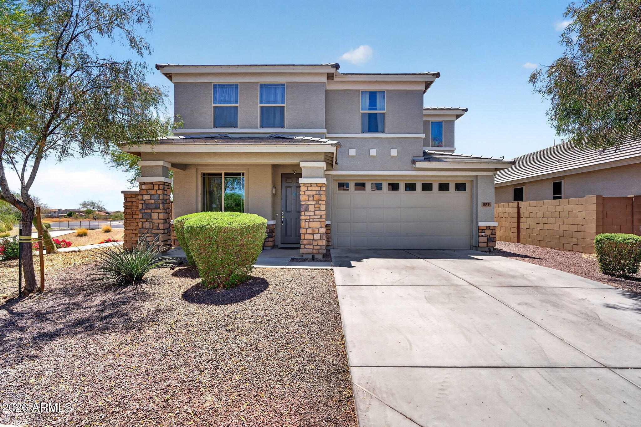 This stunning 2019-built home is perfectly tucked away at the end of a quiet street on a premium lot, offering the ultimate peaceful retreat with no neighbors on one side or behind. Inside, the modern open-concept layout is designed for both comfort and versatility, featuring 3 spacious bedrooms, 2.5 baths, and a large upstairs loft. The main floor includes a flexible bonus room--ideal for a home office, den, or gym. The heart of the home flows seamlessly to a massive extended patio, perfect for entertaining or enjoying quiet Arizona evenings. Conveniently located within walking distance to schools and just minutes from the premier shopping and dining at Prasada Gateway. Come see this spectacular home today!