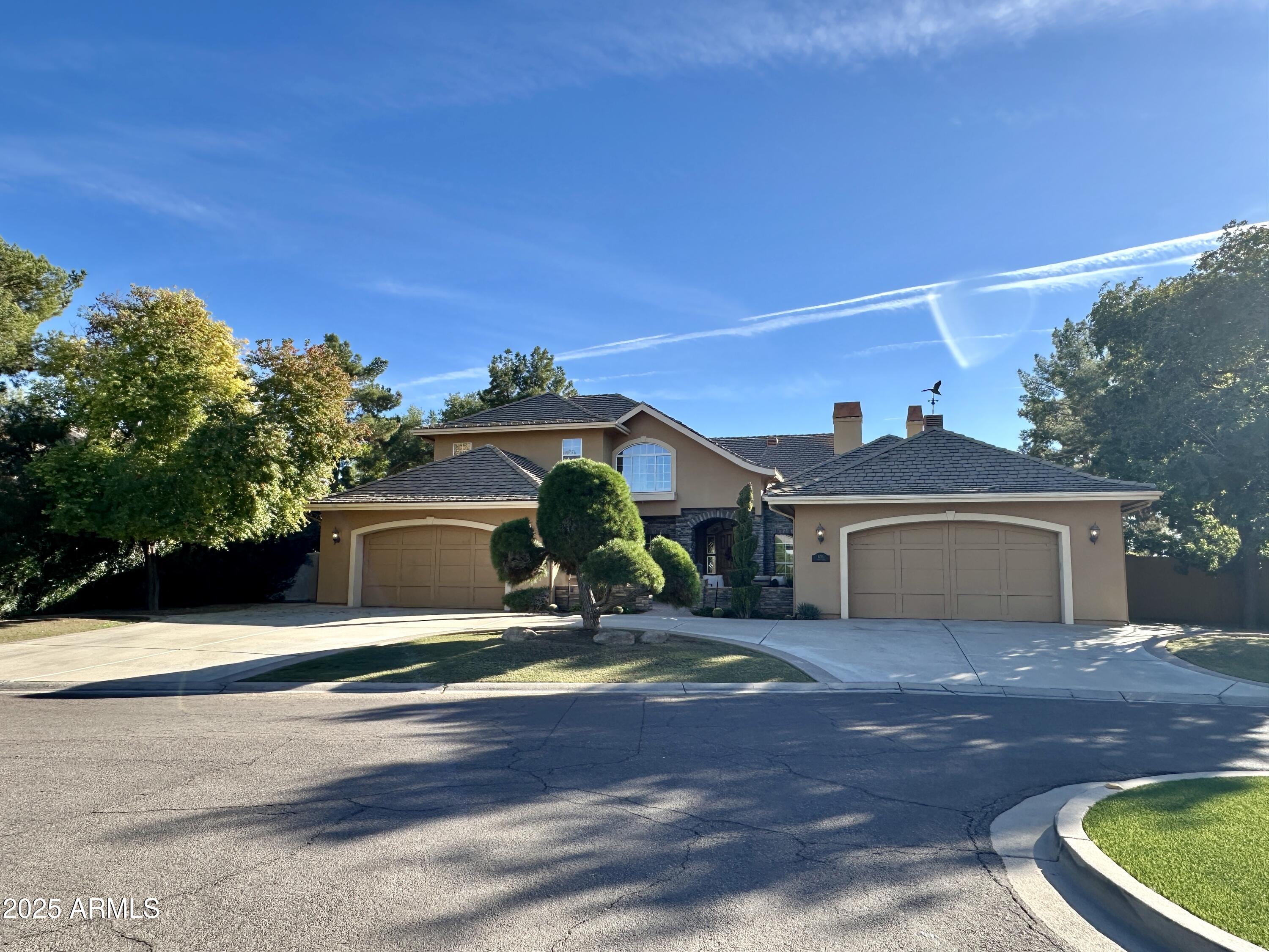 Enjoy peaceful lakefront living in this beautifully furnished home in a desirable gated Chandler community. This spacious 4-bedroom plus office, 4-bath property features a bright great-room layout, gourmet kitchen with granite island and high-end appliances, and a luxurious primary suite with lake views. Relax outdoors on the oversized patio with an outdoor kitchen, or enjoy the resort-style PebbleTec pool, spa, and waterfall on the nearly half-acre lot. Perfectly located and move-in ready--an exceptional furnished rental opportunity.