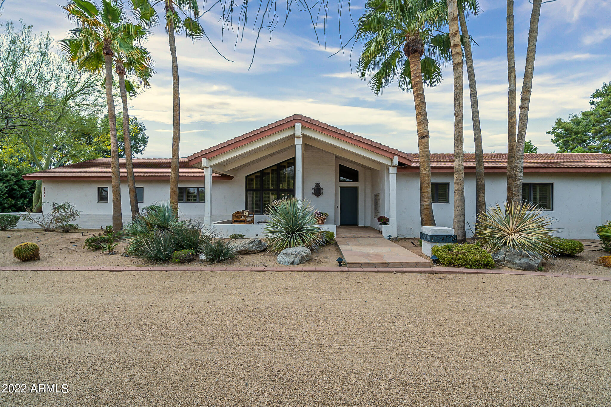 This well cared for home is positioned on one of the largest view lots in the coveted Casa Blanca Estates. With mostly uninterrupted Camelback Mountain as a stunning backdrop and grounds of mature Sonoran Desert landscaping, the low maintenance yard remains green year round. Multiple patios provide opportunity to enjoy the outdoors and the serenity of the surroundings. The interior has a comfortable layout and loads of natural light, with spacious bedrooms, mostly en suite, and ample storage. The well appointed kitchen connects to a bright breakfast room displaying a classic Arizona style-Southwest flair. The south wing also hosts a bedroom, laundry room and 3 car garage. Upgraded window treatments, automated roll down shades to keep the afternoon rays at bay! Can be purchased furnished.