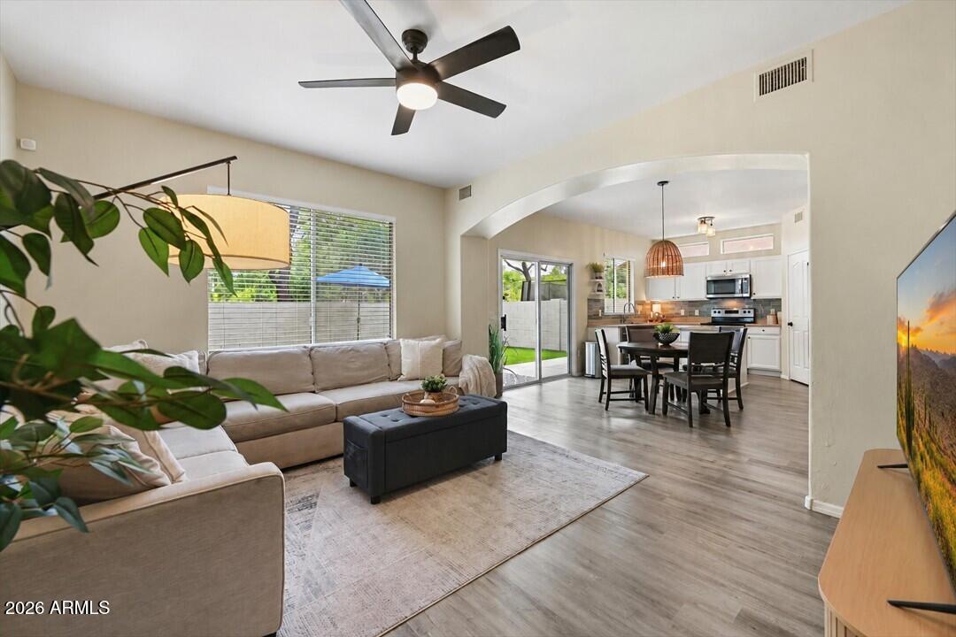 Gilbert gem! One of those special properties situated with unobstructed views of lush tree lined park and adjacent to grassy common area so only one neighbor next door. This handsomely updated move-in ready 4-bedroom, 2.5 bath offers seamless flow between family, kitchen and dining all with views to the backyard. Upstairs laundry room convenient to all bedrooms. Recent upgrades: new windows (2026), new A/C unit (2023), new water heater (2024), new washer/dryer (2025), new luxury wood like plank flooring and carpet (2022), updated bathrooms and kitchen, new light fixtures throughout, new low-maintenance turf in both the front and backyards, high-end garage door. Kitchen features durable Corian countertops, island, walk-in pantry, stylish tiled backsplash. Wonderful home and neighborhood! Located in the heart of Gilbert in a beautifully appointed neighborhood chocked full of amenities with pool, park/playground, basketball court and volleyball. Near top-rated schools, and shopping. Truly a stand out home not to be missed!