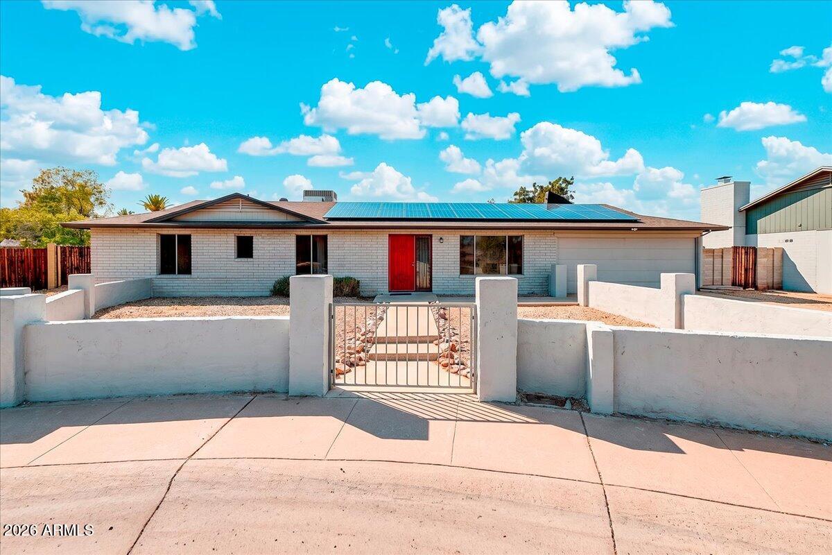 Spacious 4-bedroom, 2 bath home located on a quiet cul-de-sac. Features a large sunken living room perfect for entertaining, a spacious kitchen, and a generous eat-in dining area. The home offers a very large storage area with electricity, providing excellent space for a workshop, hobbies, or additional storage.

Enjoy the irregular-shaped backyard with lush grass and an RV gate.   While the low-maintenance desert landscaping in the front yard adds curb appeal and water efficiency. Additional energy-saving features include a solar hot water heater that can be hooked up.

This property combines comfortable living spaces, practical amenities, and a desirable cul-de-sac location.