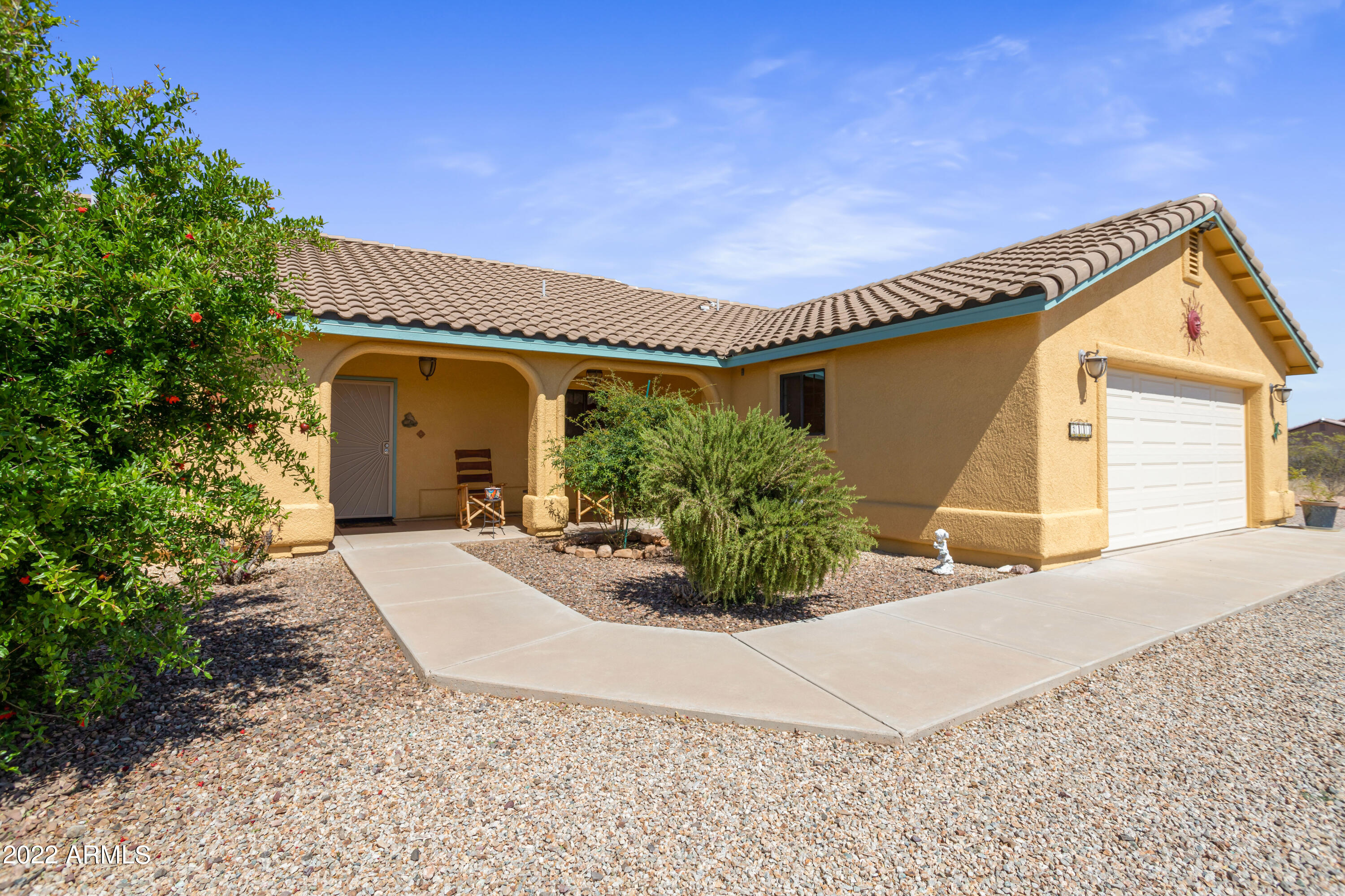 COUNTRY LIVING AT ITS BEST W/ PANORAMIC MOUNTAIN VIEWS!!! 2000+sq. ft. split/open floor plan on fenced 4 acre parcel,4 Bedroom/2 Bath, Master Bath complete with Double Vanities , Jet tub, Beautiful new tiled Shower,, Up Graded Kitchen with new  stainless steel appliances, Granite  counter tops, Refinished wood cabinets. Revise Osmosis and water softener Systems. Screen security doors 2 car garage R.V. Gate with hook ups .Low maintenance easy care landscaped yard, With Pomegranate and Peach trees Well share, Septic with risers,  20 minutes from Huachuca City /Sierra Vista.