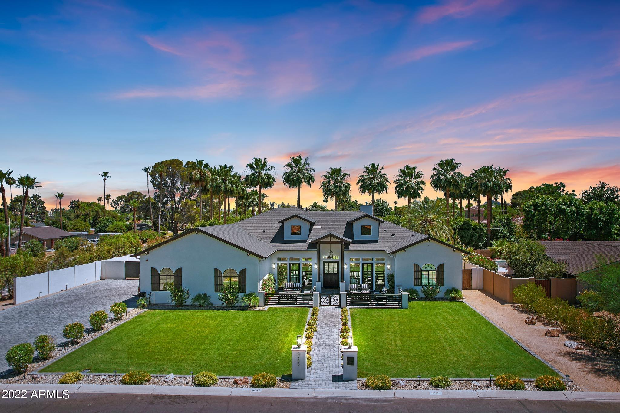 Back for a limited time with a fresh new price point! 

Modern Farm meets Timeless Elegance. This custom home located on the Scottsdale side of Arcadia Proper, one of the most coveted neighborhoods in all of Scottsdale/Phoenix! This Pearl Energy Certified, Split-4 Bedroom & 3.5 Bathroom home boasts stunning curb appeal with lush grass, 12ft ceilings, high-end finishes, lavish primary wing and a bright open floor plan. This beautiful home will stun anyone who walks through! The resort style backyard provides a perfect setting for relaxing and entertaining & the large front courtyard equipped with a gas fire pit makes a perfect place for evening wine and family gatherings. Don't forget about the oversized 3-car garage & 9-car driveway. This gorgeous home is a TURN-KEY MUST SEE! All Bedrooms are en-suite with walk-in closets. Master closet has additional washer & dryer. Home is Pearl Energy Certified that provides extremely low energy bills less than $300. Also fully equipped with smart features, smart sound, and full security system with exterior cameras. Ask for a list of upgrades & updates as no expense was spared making this the perfect home!