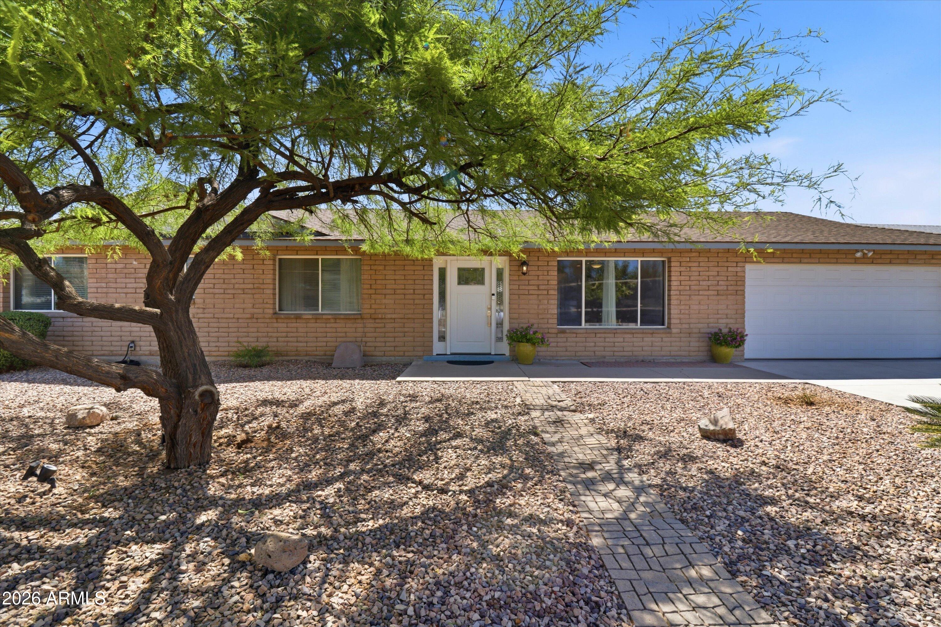 POOL | RV GATE | DETACHED A/C OFFICE | NO HOA | UPDATED THROUGHOUT!

Set on a large lot in a prime North Phoenix location, this updated single-level home offers a practical layout, modern finishes, and standout indoor-outdoor living. Inside, you'll find tile flooring throughout, a remodeled kitchen with quartz countertops, and updated bathrooms, creating a clean and functional move-in ready feel. The layout includes 4 bedrooms and 2 bathrooms across 1,670 sq. ft., designed for both everyday living and flexibility.

One of the standout features is the detached A/C-equipped office or den, ideal for a home office, gym, creative studio, or bonus flex space. The backyard continues to deliver with a pool, RV gate, large covered patio, and recent driveway and garage improvements, including a garage motor and exterior keypad. A custom-built front door adds an elevated first impression and extra character to the home.

The primary suite features a spacious walk-in closet and walk-in shower, with additional closet systems thoughtfully added for organization and storage throughout the property.

Positioned near I-17 and Loop 101, this location allows quick access across the Valley while keeping everyday conveniences close by. Nearby destinations include Costco, Fry's, In-N-Out Burger, AMC Deer Valley, Deer Valley Park, and HonorHealth Deer Valley Medical Center, making daily routines simple and accessible.

A well-located North Phoenix home with the right updates, usable space, and flexibility for a variety of lifestyles.