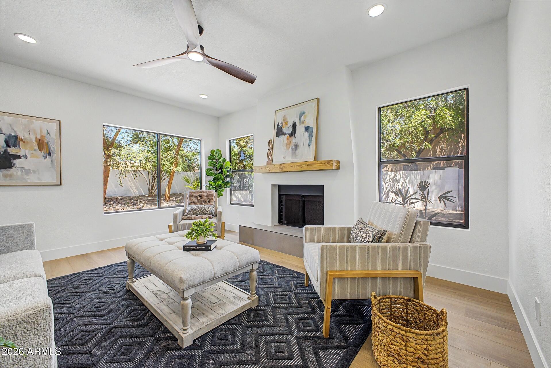 Amazing Remodel/Outstanding location in the HEART of GILBERT. This 5-bedroom, 3-bath estate with a spacious 3-car garage, situated on a generous lot features new turf and pavers. Step inside to soaring ceilings, abundant natural light, and refined  finishes throughout. Designer tile and flooring, custom-designed bathrooms, and an open, inviting floor plan create the perfect blend of luxury and comfort. Bedroom and Full Bathroom on first level. The gourmet kitchen is thoughtfully designed with quartz countertops, ample cabinetry, and generous storage, making it ideal for both everyday living and entertaining. Remodeled from top to bottom by licensed contractors, this home includes a 2-year workmanship warranty for added peace of mind. The roof underlayment has also been recently replaced. Located in a highly sought-after school district, you'll enjoy convenient access to shopping, dining, entertainment, Loop 101, and US 60, making commuting anywhere in the Valley quick and easy.

Don't miss this rare opportunity to own a truly one-of-a-kind home that combines timeless elegance with modern upgrades.

See Docs for a FULL List of Upgrades.