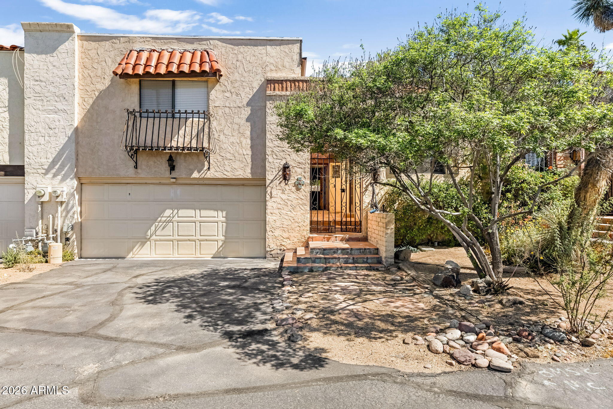 Experience authentic Carefree living in this charming 1,731 sq ft, 2-bedroom, 2-bath 2 car garage townhouse in the desirable Carefree Casas community. Featuring Spanish-inspired charm with Saltillo tile, a romantic beehive fireplace, and an enclosed private patio, this remodeled home offers a ''secret garden'' feel, it's steps from the community pool. This home has Southwest character and Carefree charm. Walkable -  located a short walk from the iconic Carefree Sundial, local boutiques, and plenty of dining.
It's a peaceful retreat situated in a calm, low-traffic neighborhood that captures the quiet majesty of the Sonoran Desert.
Make it your full time home or lock and leave. Spacious outdoor area!  Enjoy the sparkling community pool and beautifully landscaped grounds. Has RO system Short and Long term rentals allowed and the Town of Carefree has some specific guidelines for it and licensing is required.