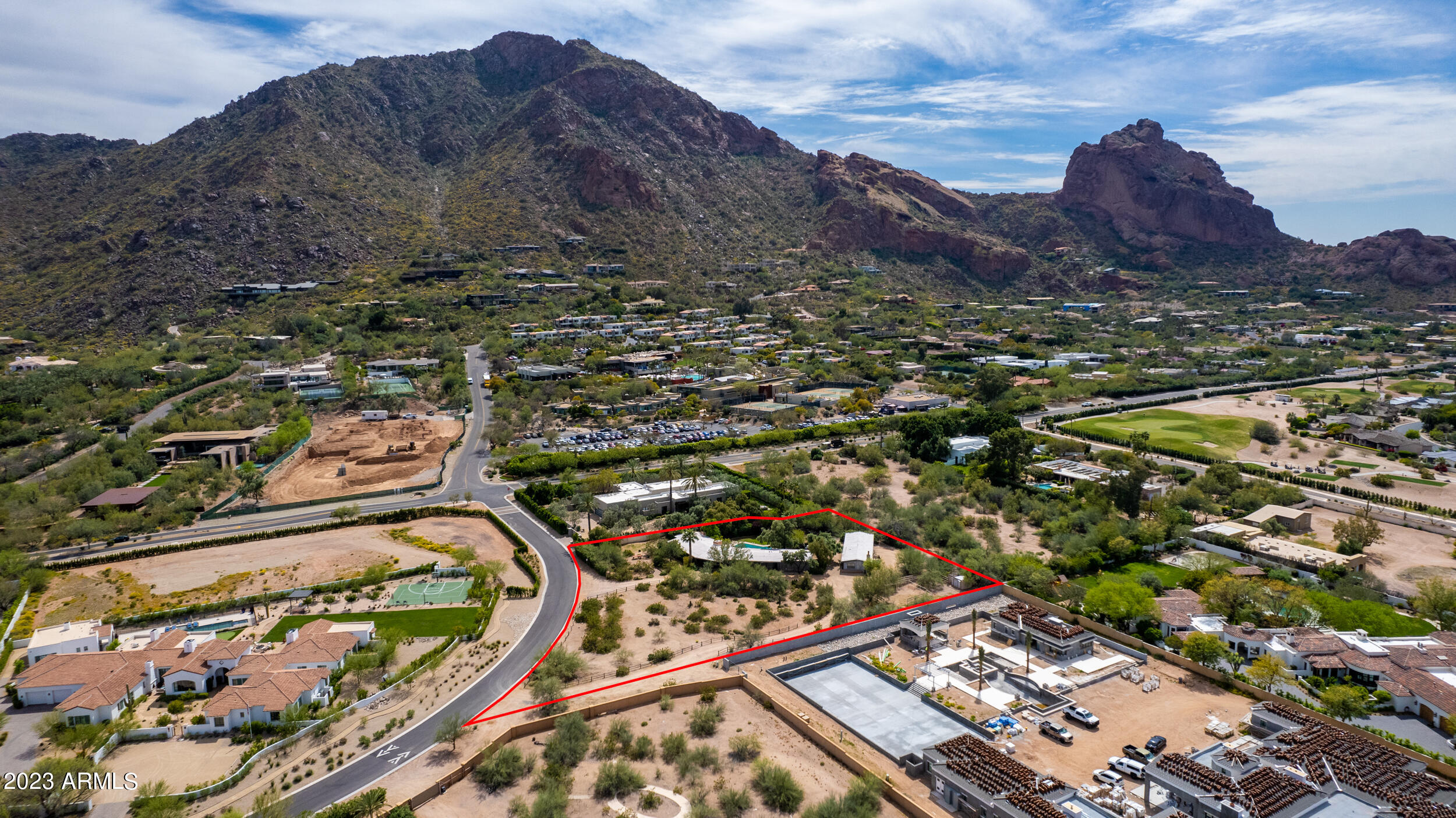 On approx 1.5 acre sized lot with captivating Camelback Mountain views, Gerry Jones original designed home and guest quarters located in one of PV's most sought after locations. Endless potential.