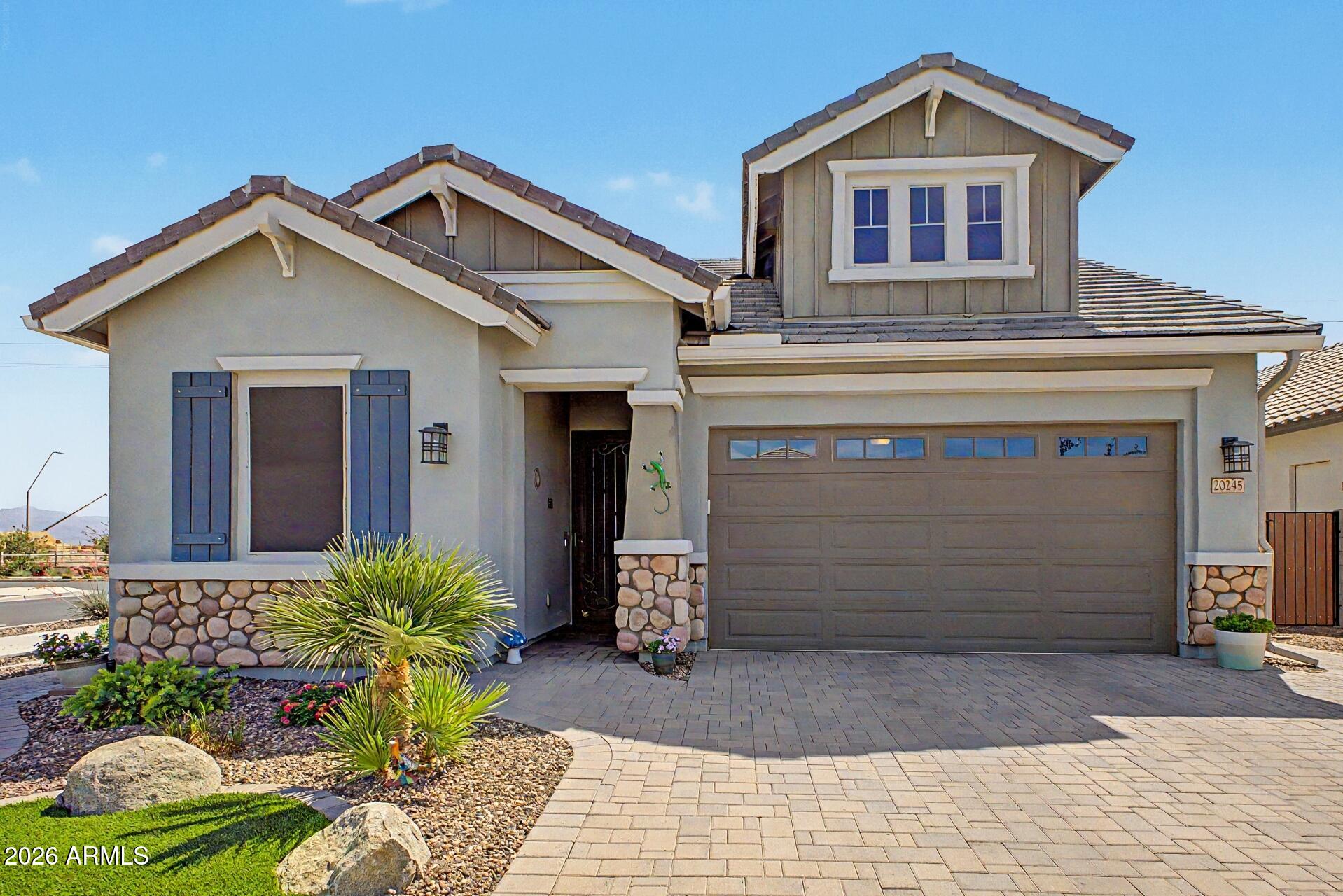 Welcome to Life at Barney Farms in Queen Creek! Discover a home that perfectly blends premium, homeowner-completed upgrades with the vibrant lifestyle you've been dreaming of. Imagine weekends spent fishing in the community lake, relaxing by the resort-style pool, or playing pickleball--all just steps from your front door. This exceptional residence stands out with fantastic custom improvements, including a spa-like walk-in shower, a built-in fireplace and heater perfect for patio entertaining, and a stunning 3-column water feature. Best of all, the home features professionally installed seasonal holiday lights for effortless, standout curb appeal. Don't miss this turnkey gem in one of Queen Creek's premier neighborhoods!