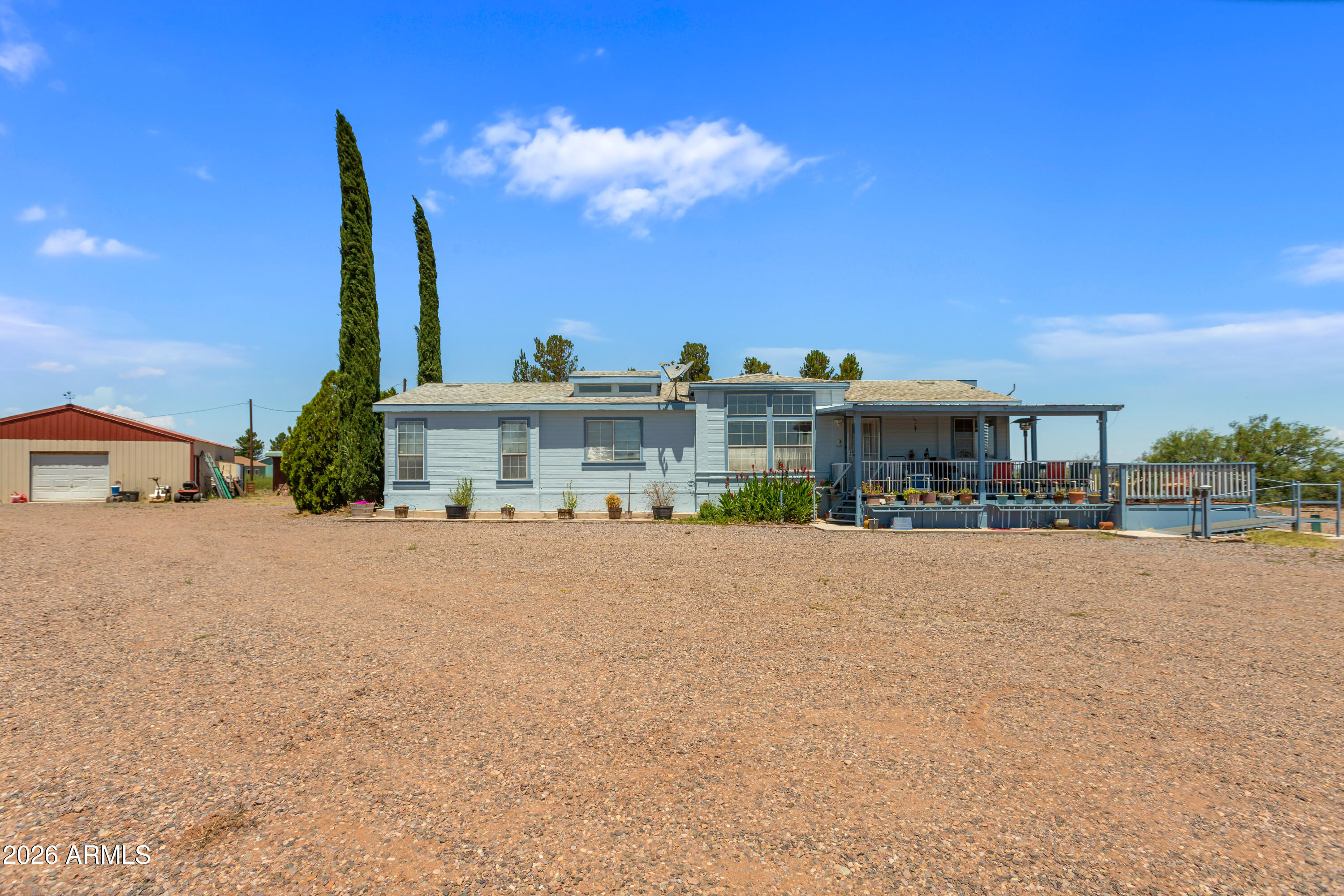 Beautiful country property located near Douglas with sweeping views of the mountains & Douglas city lights. This home features many updates including a newer dual AC/heat system, new exterior paint, a newer well pump and so much more!
Outside, you'll find a detached 30x40 workshop complete with power, water, and an evaporative cooler. The 4.79 ac property offers plenty of mature trees on irrigation for low-maintenance enjoyment.
Inside features a split floor plan, tile flooring, large windows for natural light, and a spacious primary suite with a walk-in closet. Enjoy relaxing or entertaining on the beautiful decks while taking in the peaceful country setting and stunning views.